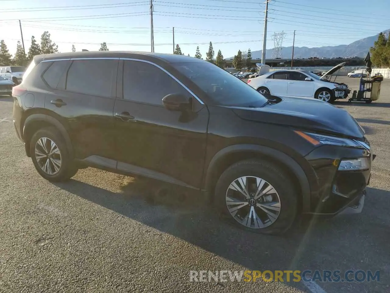 4 Photograph of a damaged car 5N1BT3BA4NC671941 NISSAN ROGUE 2022
