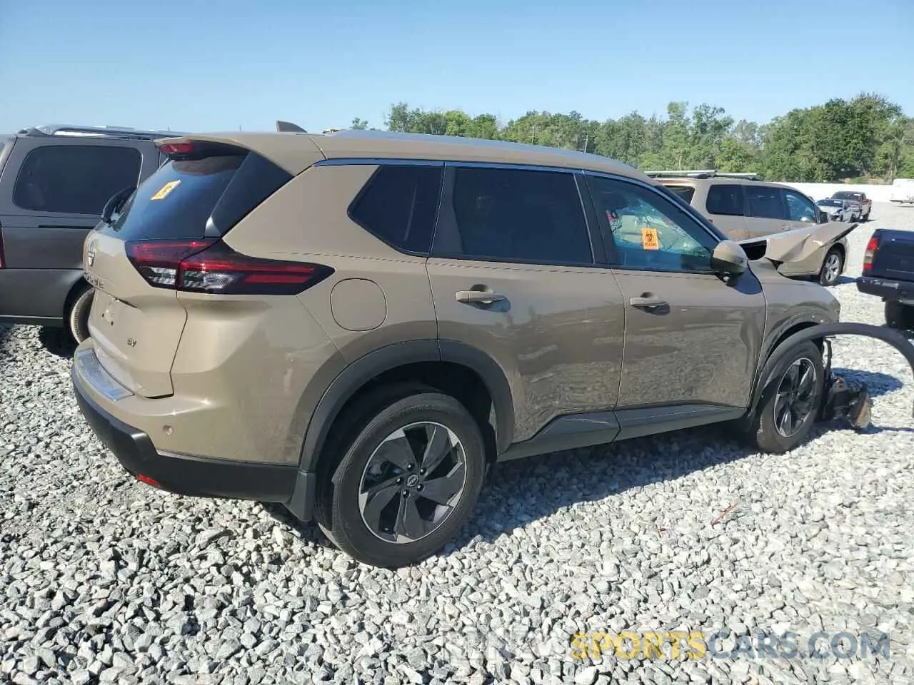 3 Photograph of a damaged car 5N1BT3BA8RC711007 NISSAN ROGUE 2024