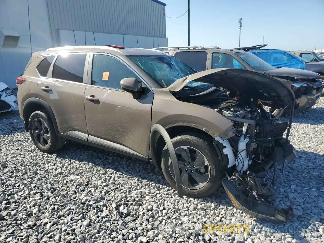 4 Photograph of a damaged car 5N1BT3BA8RC711007 NISSAN ROGUE 2024