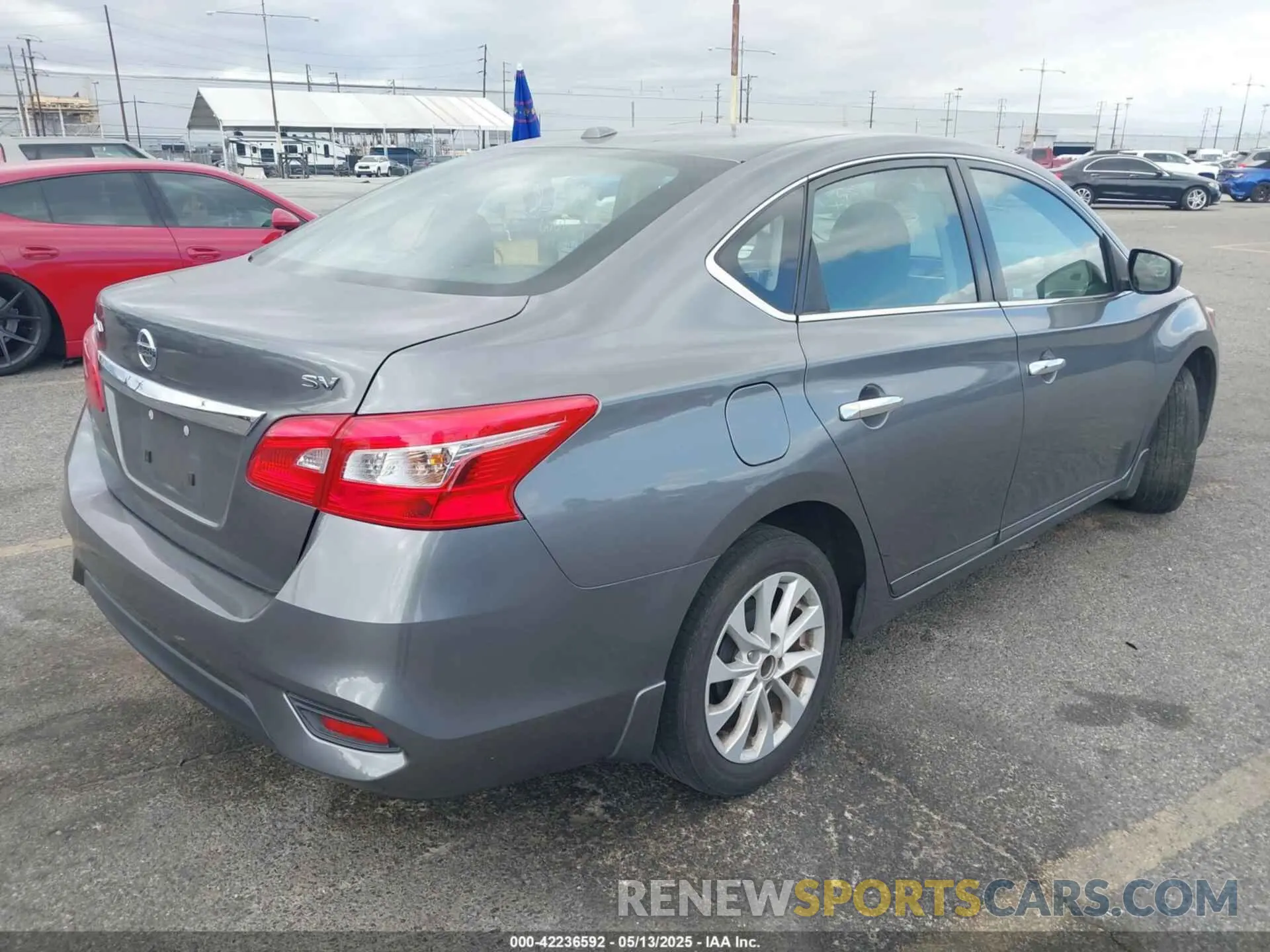 4 Photograph of a damaged car 3N1AB7AP3KY327751 NISSAN SENTRA 2019