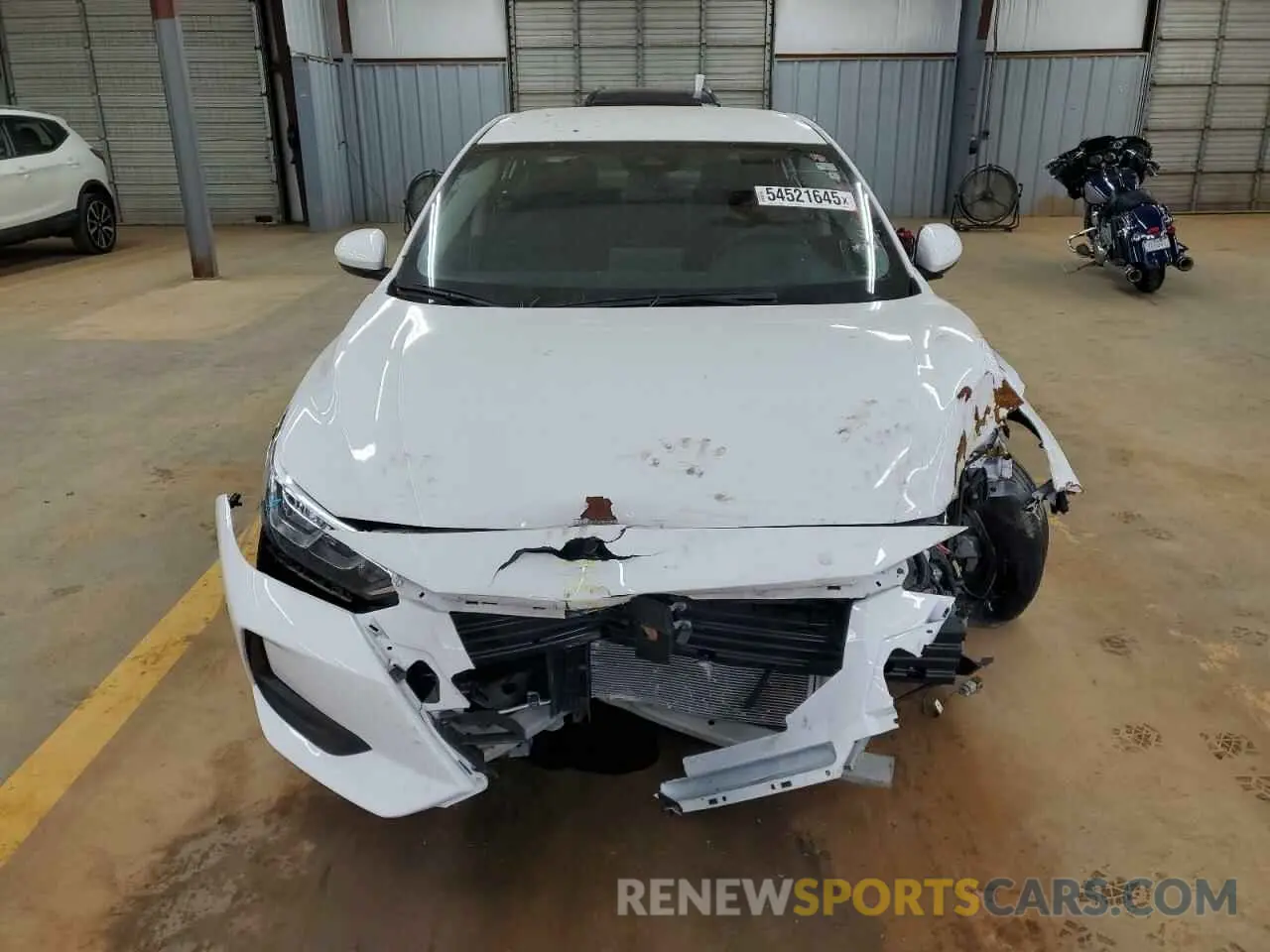 5 Photograph of a damaged car 3N1AB8CV4PY302012 NISSAN SENTRA 2023