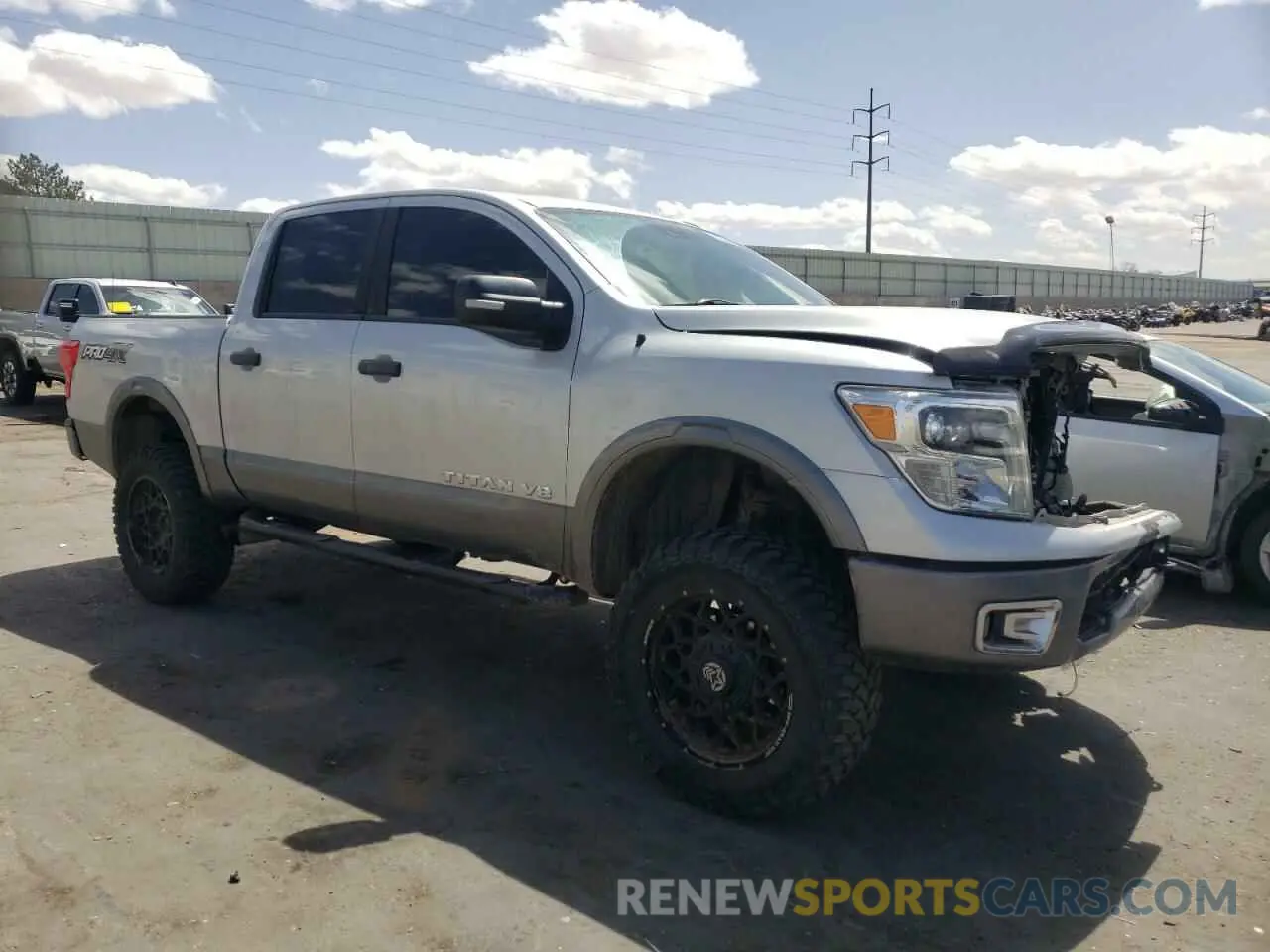 4 Photograph of a damaged car 1N6AA1E50KN506720 NISSAN TITAN 2019