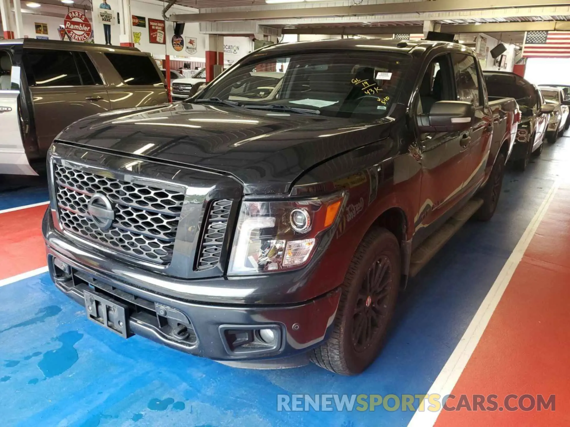 28 Photograph of a damaged car 1N6AA1E52KN530677 NISSAN TITAN 2019