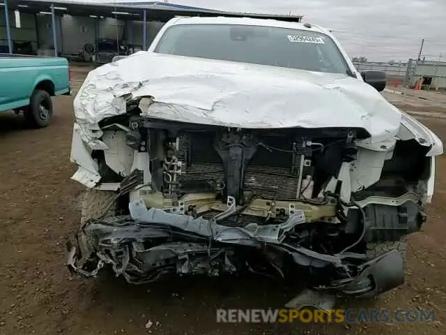 11 Photograph of a damaged car 1N6AA1CC8MN509952 NISSAN TITAN 2021