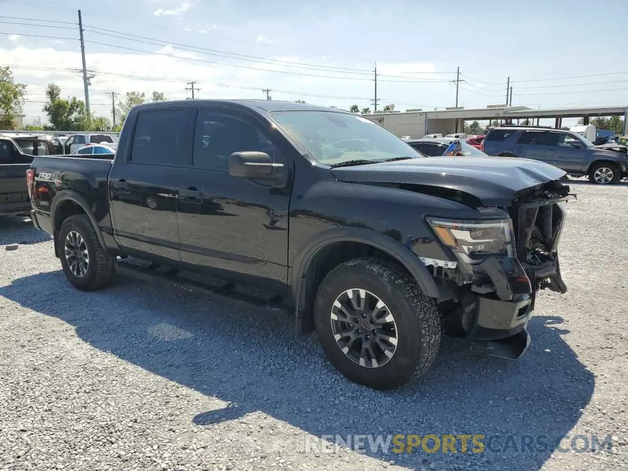 4 Photograph of a damaged car 1N6AA1ED2PN115843 NISSAN TITAN 2023