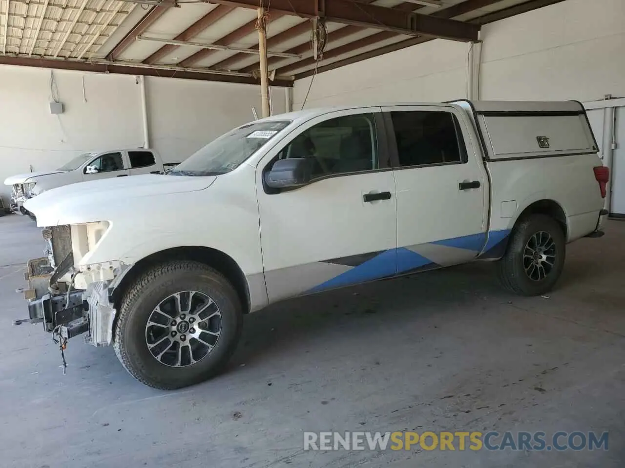 1 Photograph of a damaged car 1N6AA1EC3RN103324 NISSAN TITAN 2024