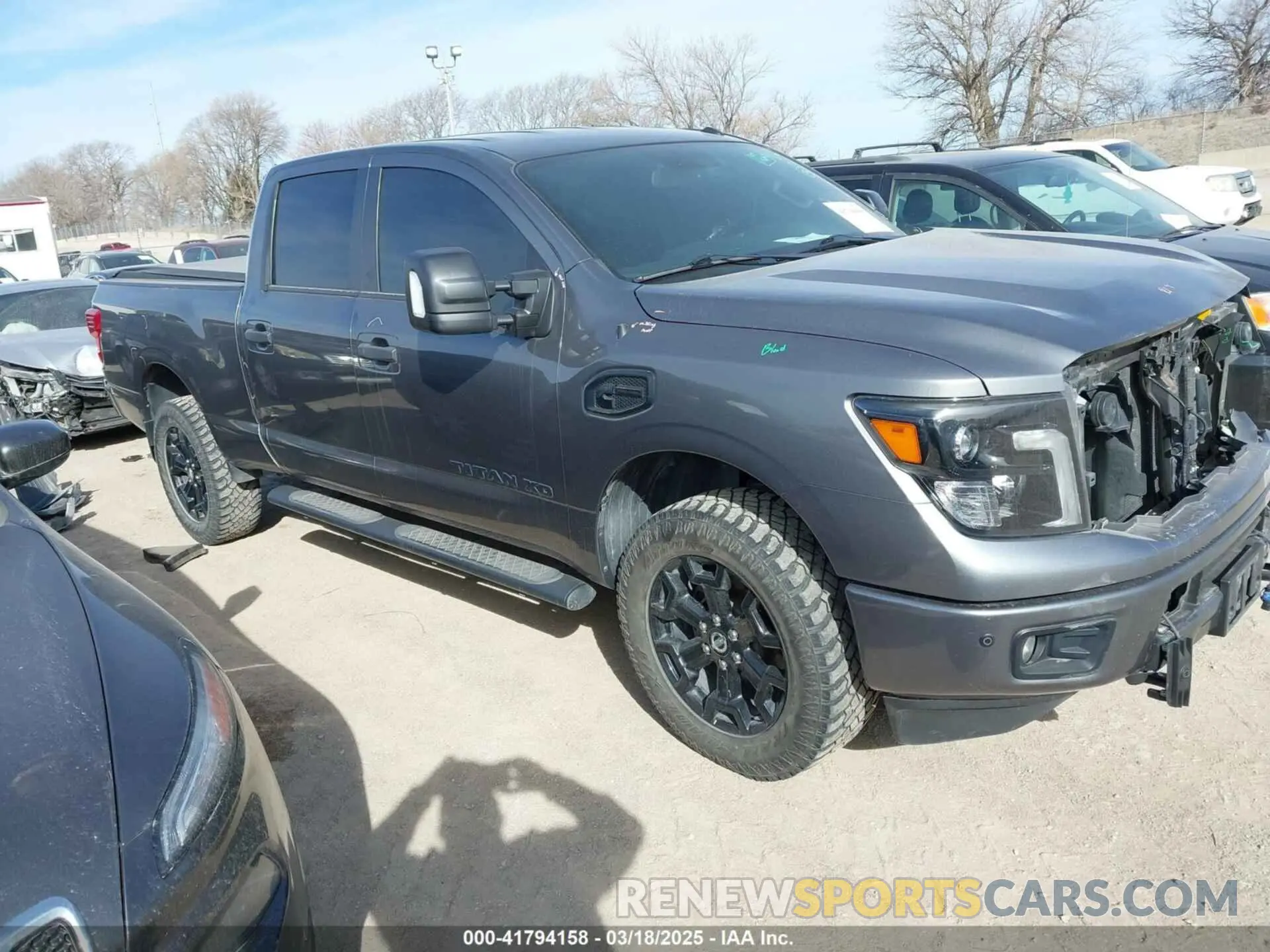 1 Photograph of a damaged car 1N6BA1F41KN529532 NISSAN TITAN XD 2019