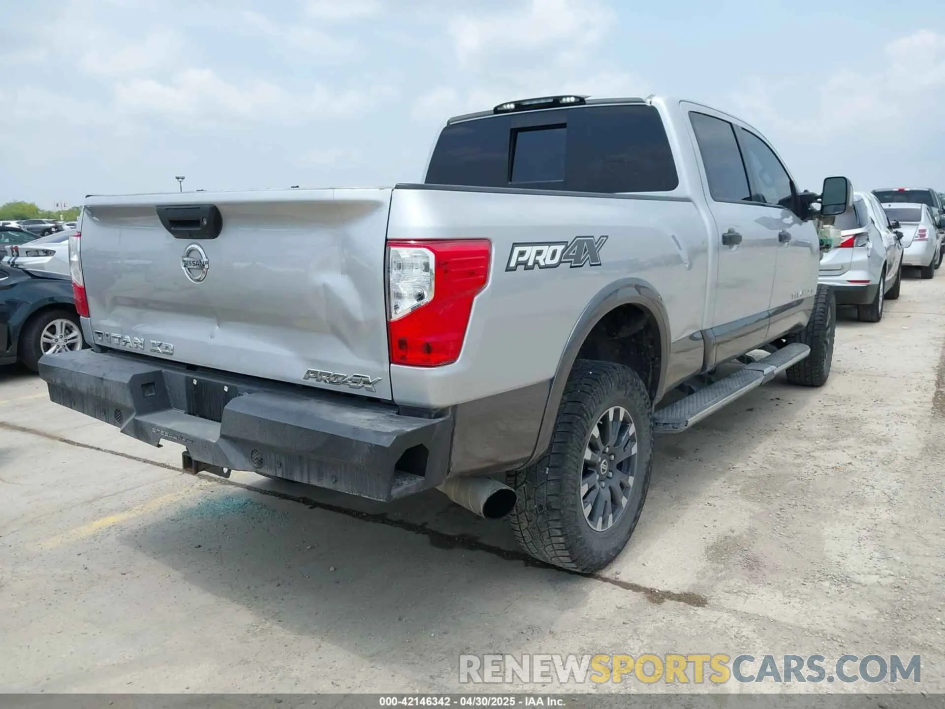 4 Photograph of a damaged car 1N6BA1F43KN524400 NISSAN TITAN XD 2019