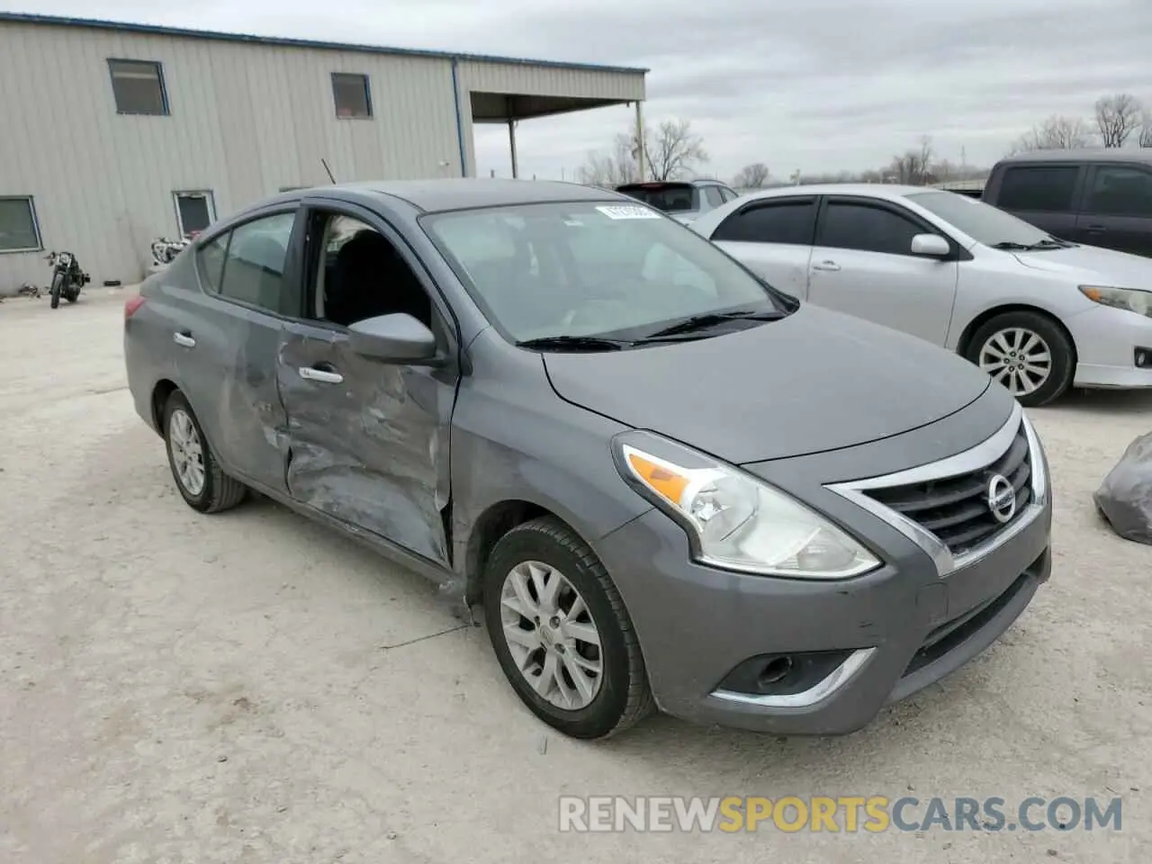 4 Photograph of a damaged car 3N1CN7AP0KL823569 NISSAN VERSA 2019