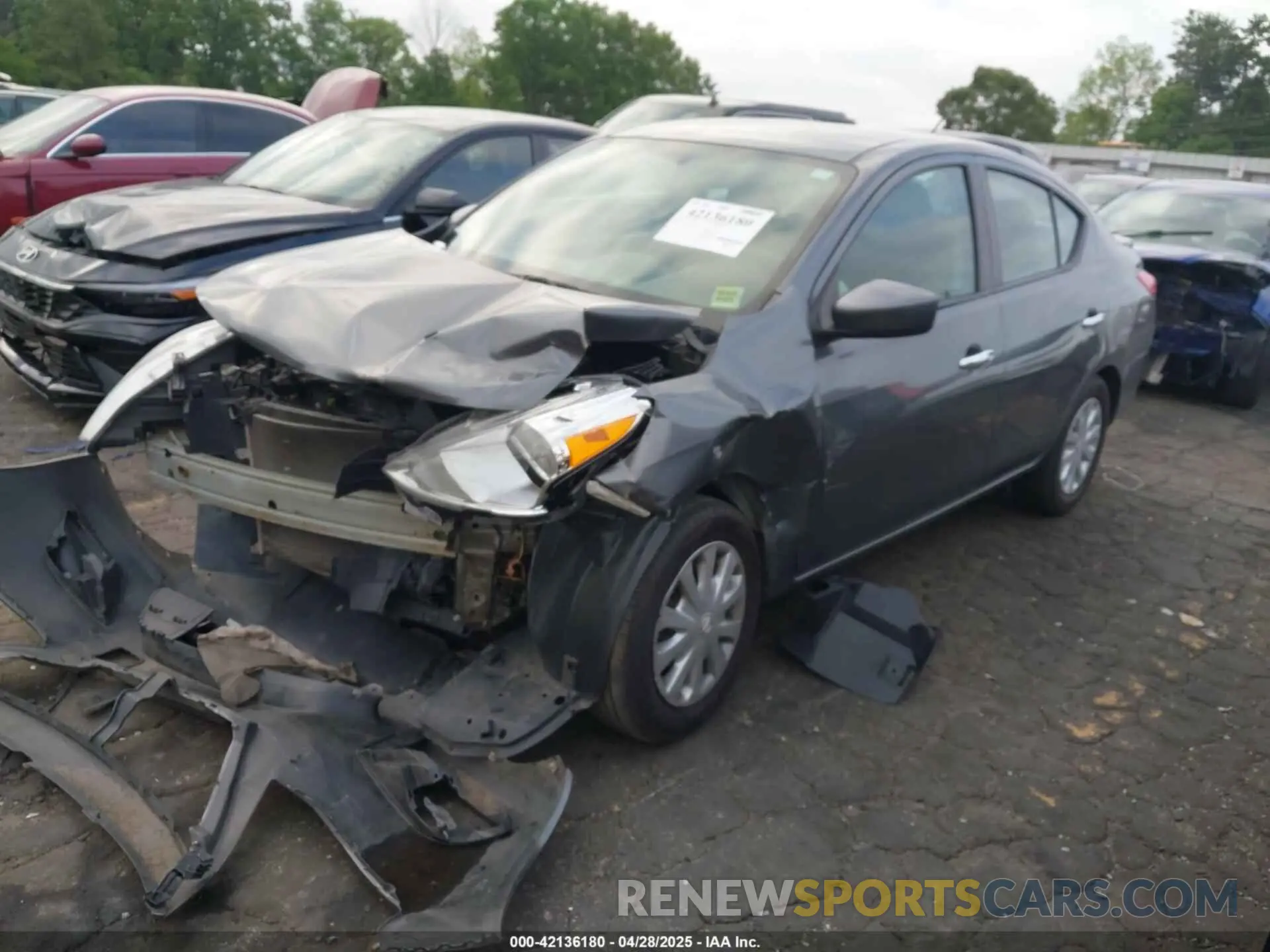 2 Photograph of a damaged car 3N1CN7AP1KL869816 NISSAN VERSA 2019