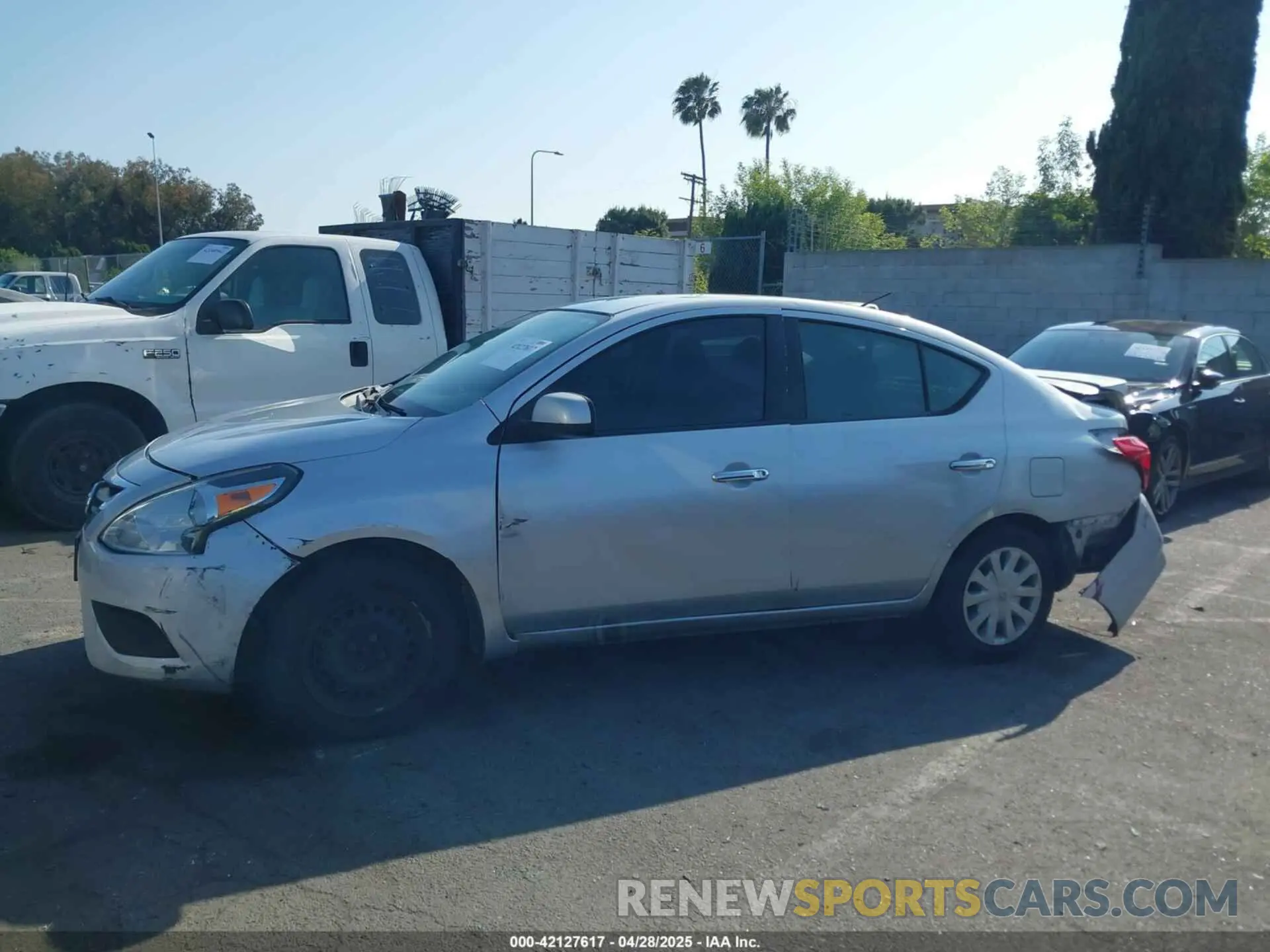 14 Photograph of a damaged car 3N1CN7AP2KL843581 NISSAN VERSA 2019