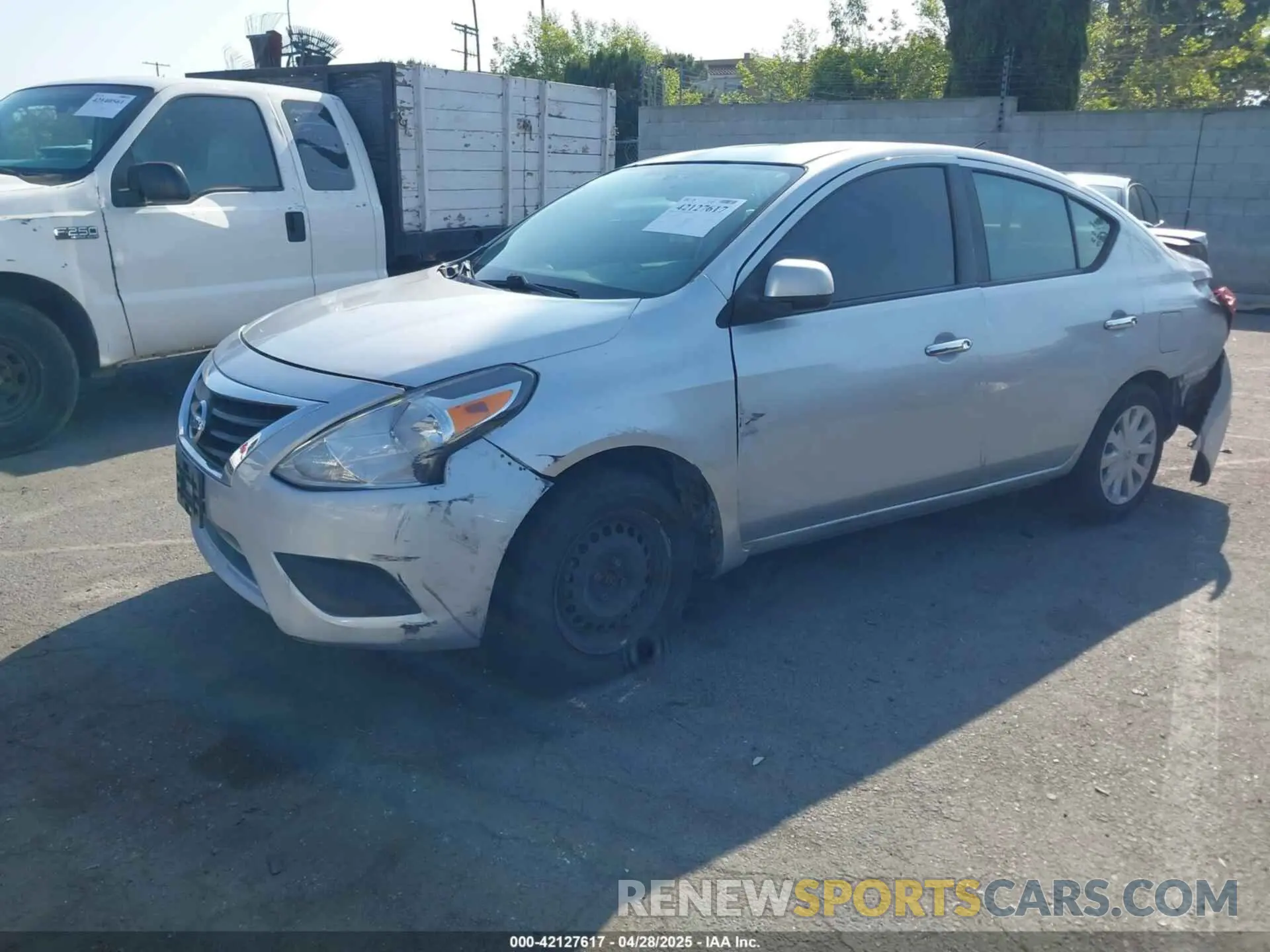 2 Photograph of a damaged car 3N1CN7AP2KL843581 NISSAN VERSA 2019