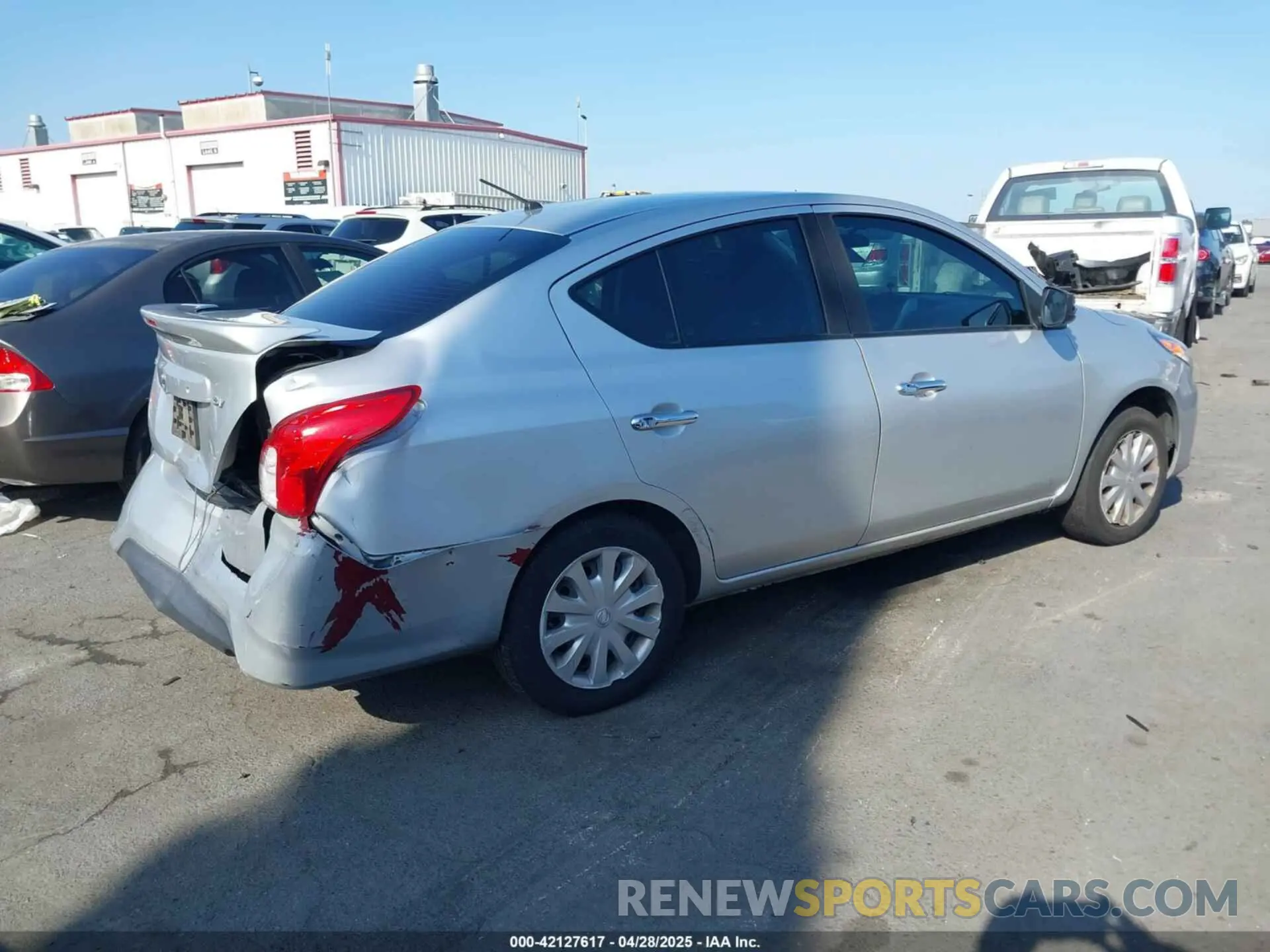 4 Photograph of a damaged car 3N1CN7AP2KL843581 NISSAN VERSA 2019