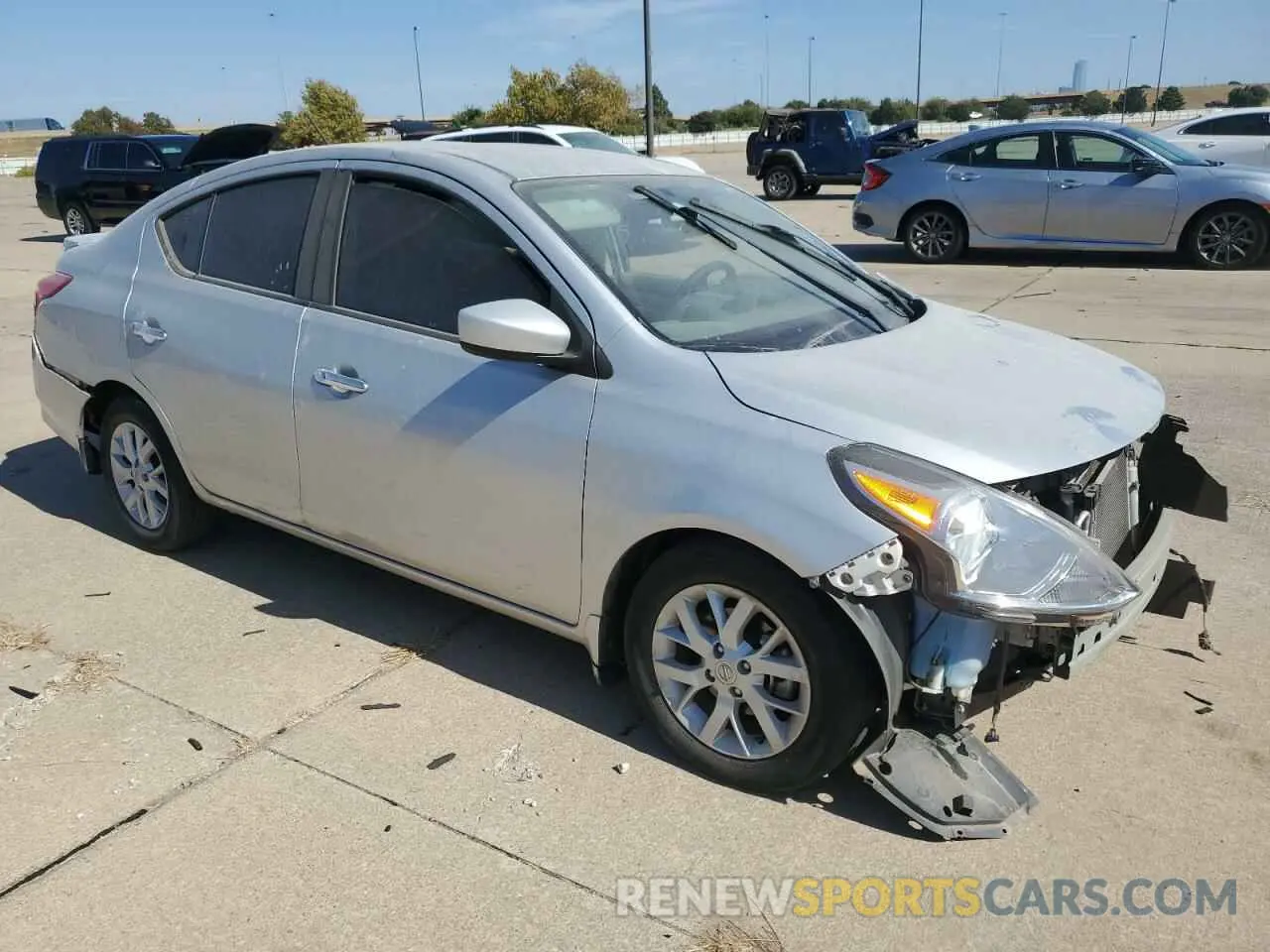 4 Photograph of a damaged car 3N1CN7AP3KL828894 NISSAN VERSA 2019