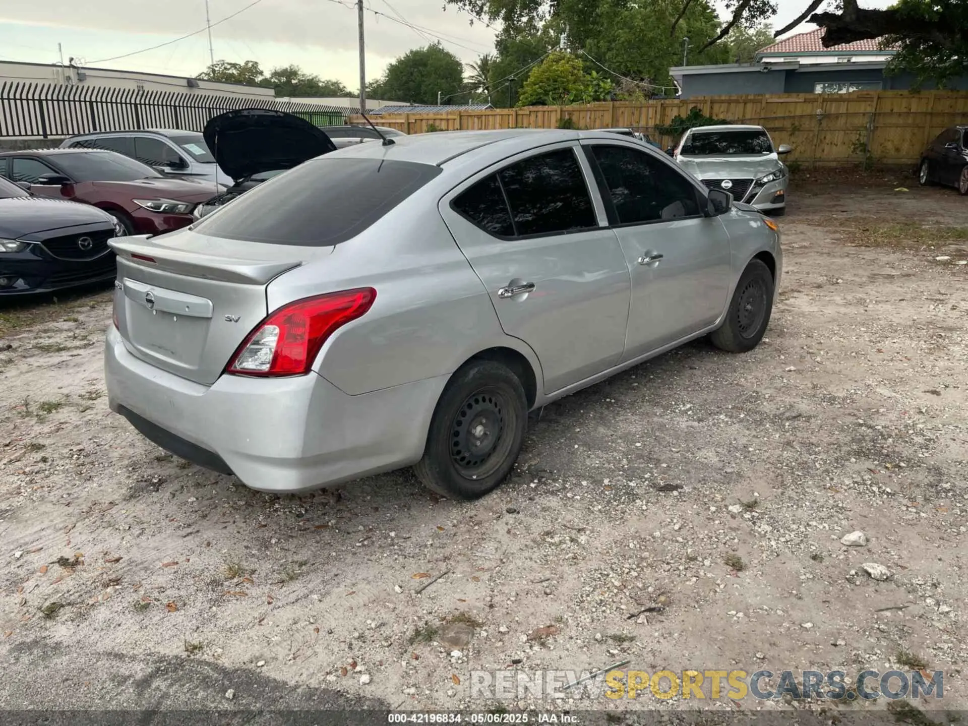 4 Photograph of a damaged car 3N1CN7AP4KL804958 NISSAN VERSA 2019