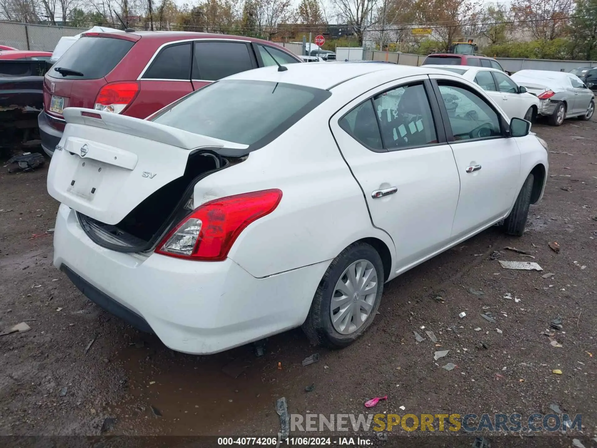 4 Photograph of a damaged car 3N1CN7AP4KL854369 NISSAN VERSA 2019