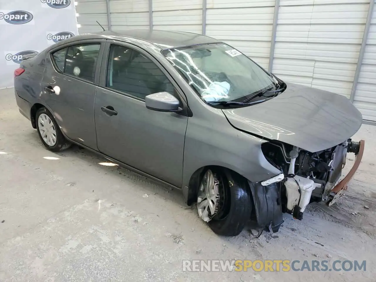 4 Photograph of a damaged car 3N1CN7AP5KL818254 NISSAN VERSA 2019