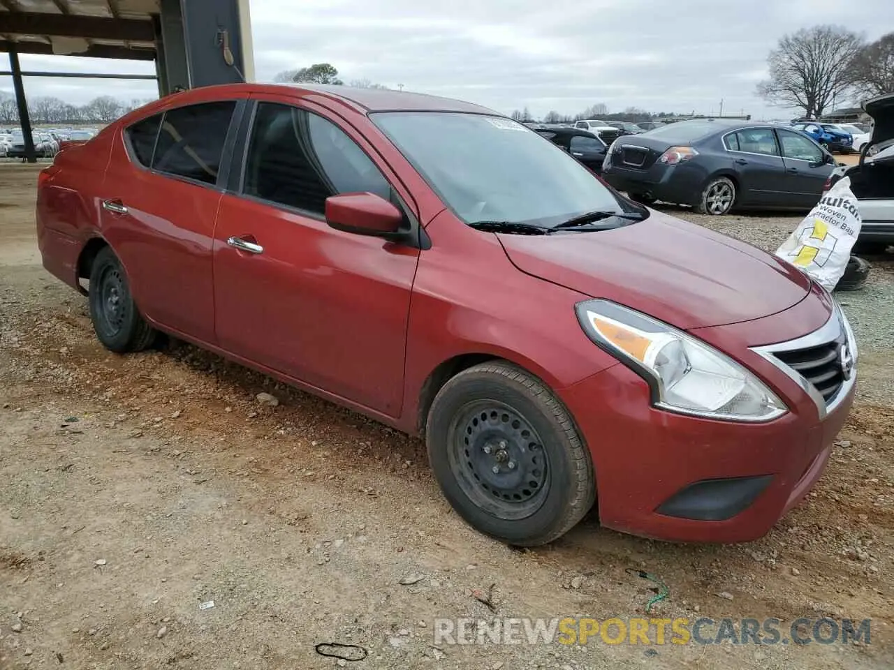 4 Photograph of a damaged car 3N1CN7AP6KL870413 NISSAN VERSA 2019