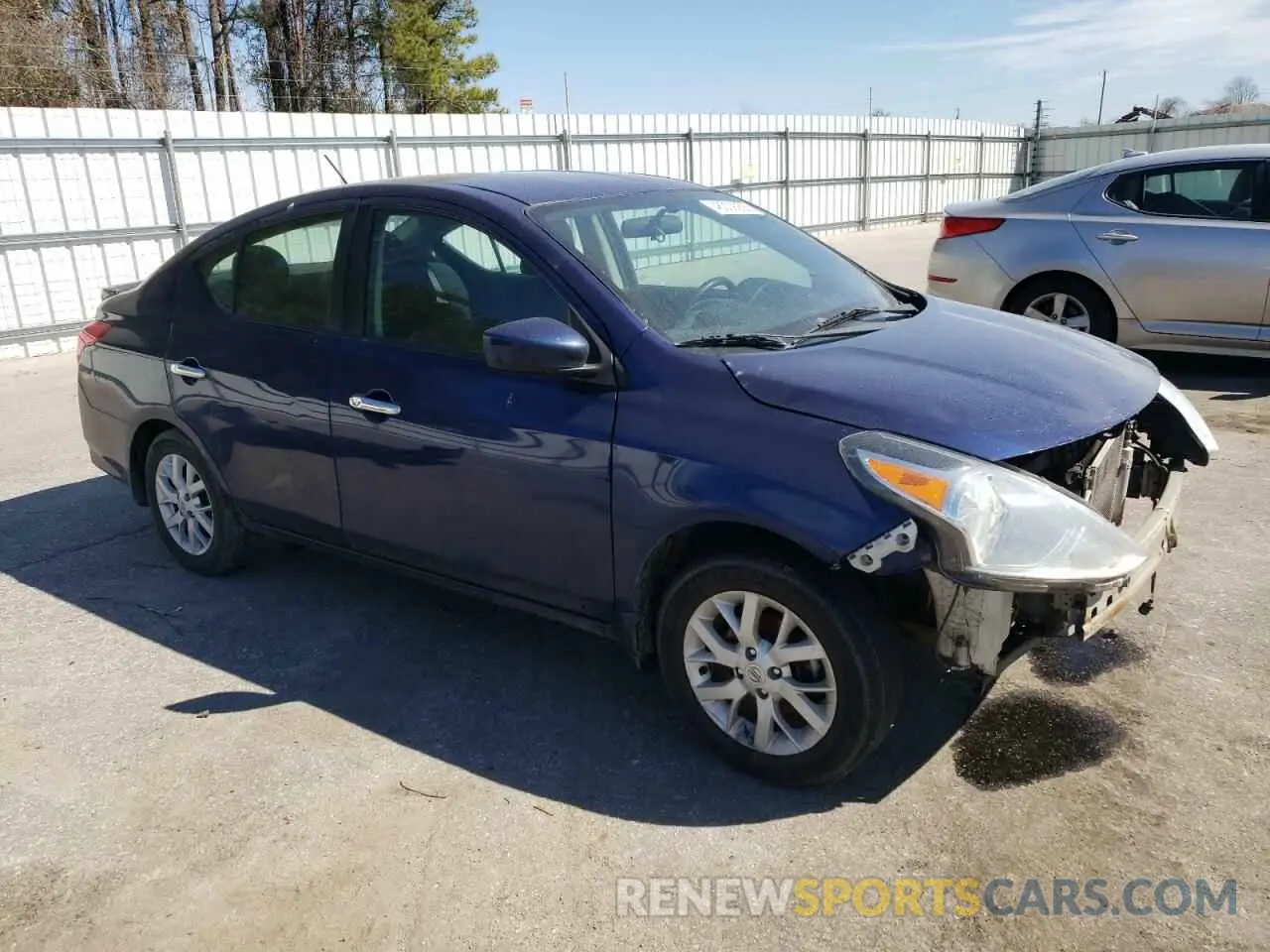 4 Photograph of a damaged car 3N1CN7AP7KL826128 NISSAN VERSA 2019