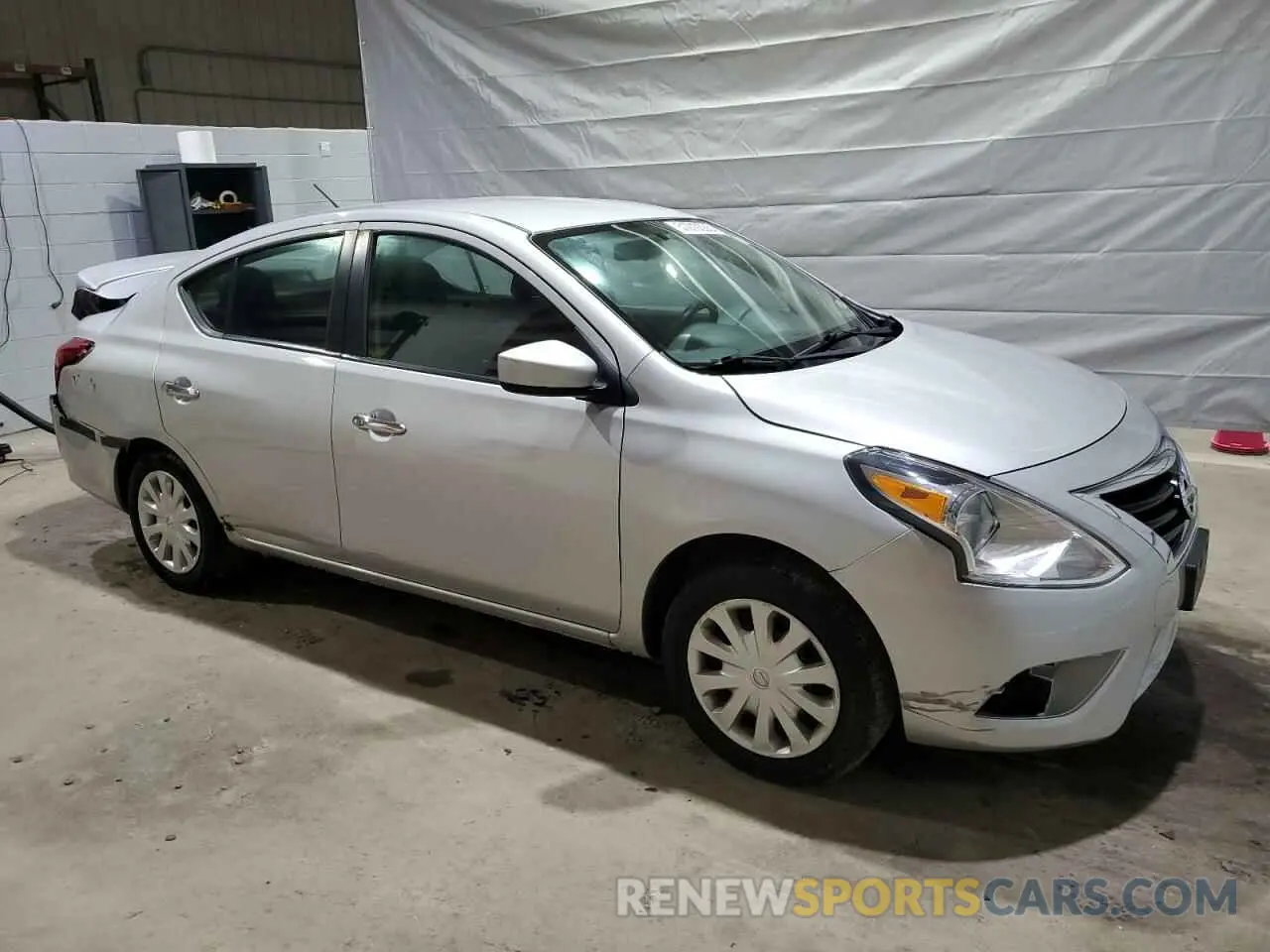 4 Photograph of a damaged car 3N1CN7AP7KL875992 NISSAN VERSA 2019