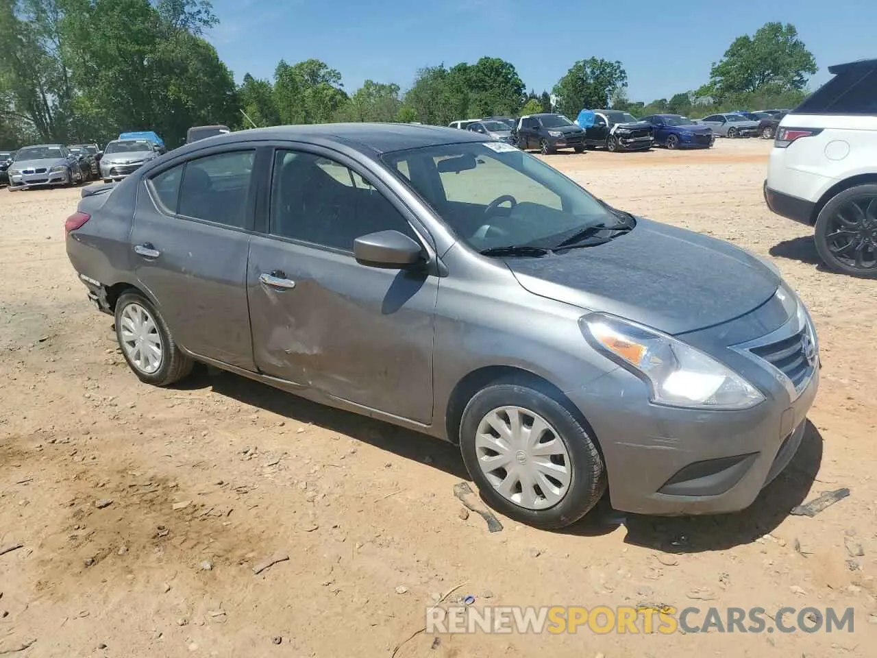 4 Photograph of a damaged car 3N1CN7AP8KL815526 NISSAN VERSA 2019