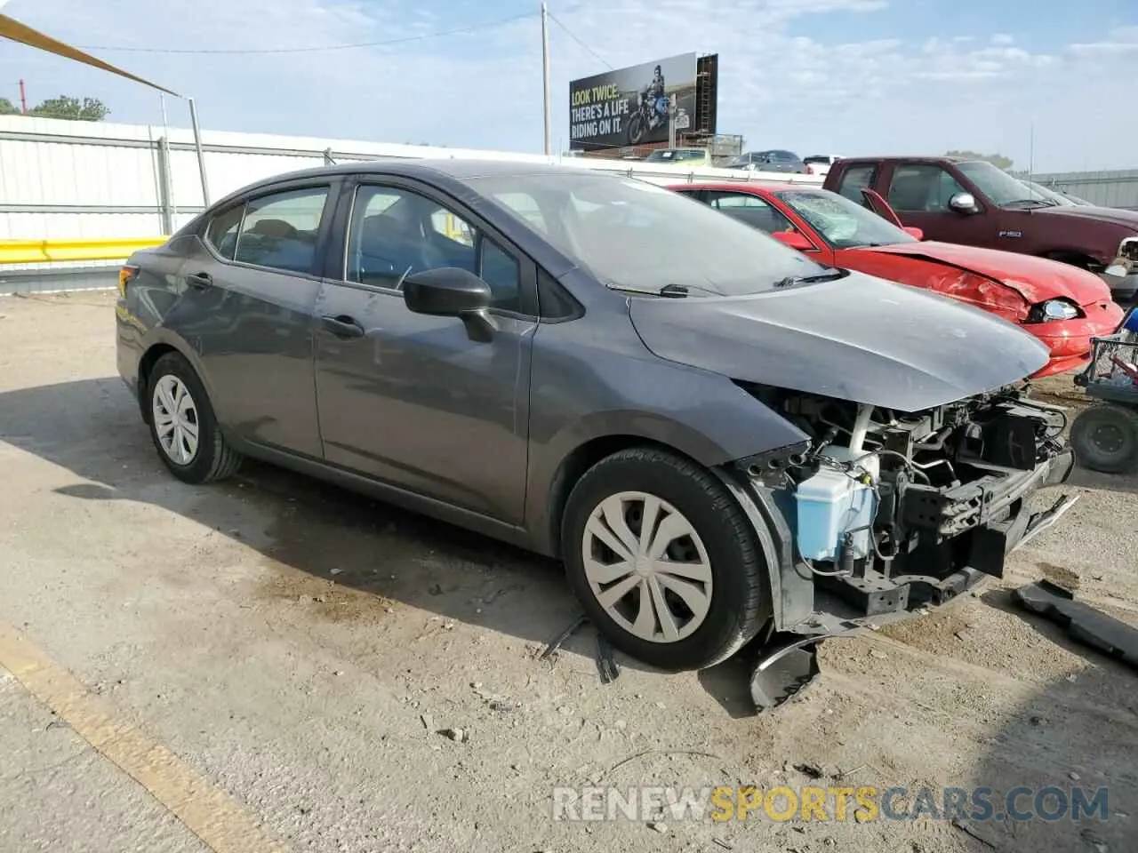 4 Photograph of a damaged car 3N1CN8DV3LL903224 NISSAN VERSA 2020