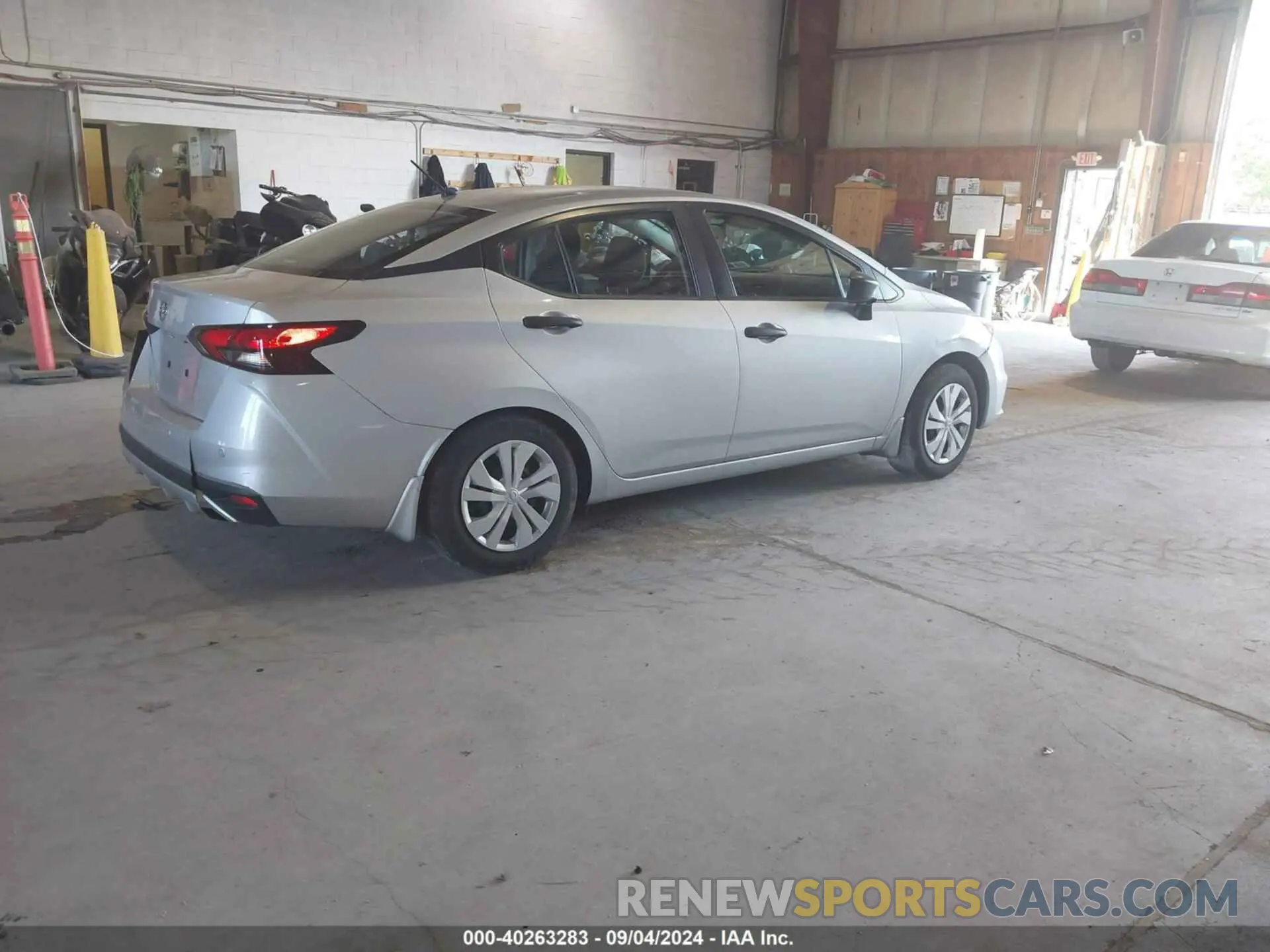 4 Photograph of a damaged car 3N1CN8DV8LL810389 NISSAN VERSA 2020