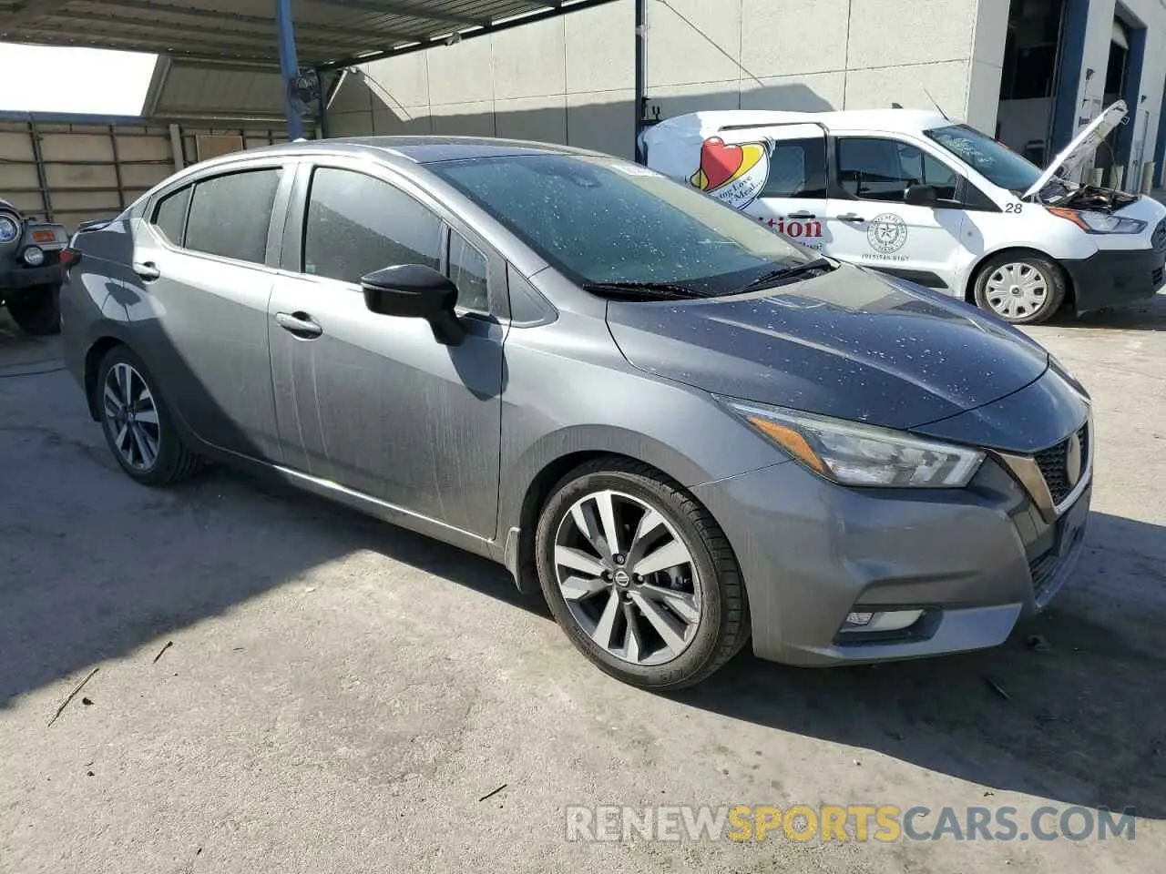 4 Photograph of a damaged car 3N1CN8FV2LL832160 NISSAN VERSA 2020