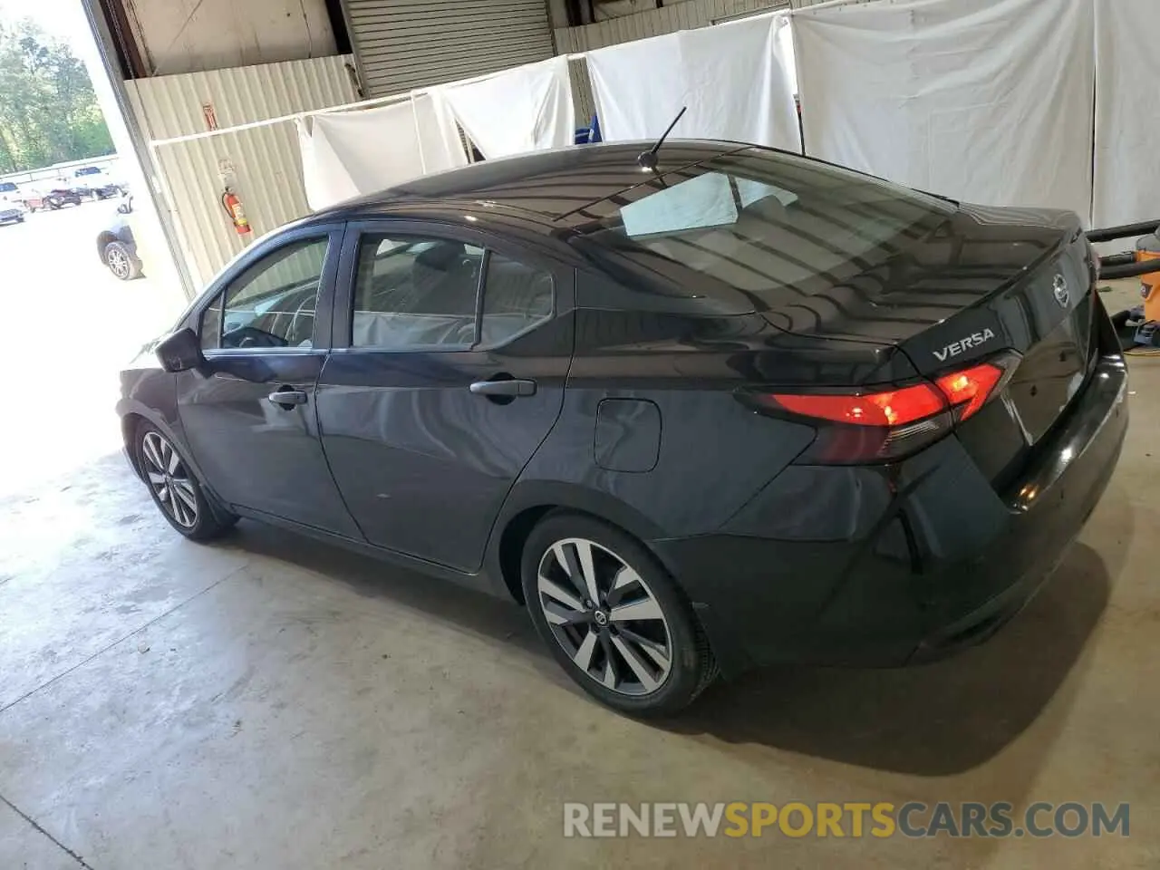 2 Photograph of a damaged car 3N1CN8DV9ML854516 NISSAN VERSA 2021