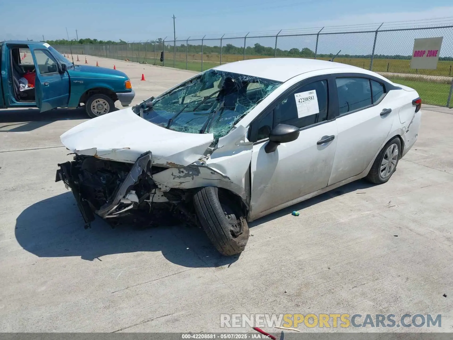 2 Photograph of a damaged car 3N1CN8DV2PL823290 NISSAN VERSA 2023