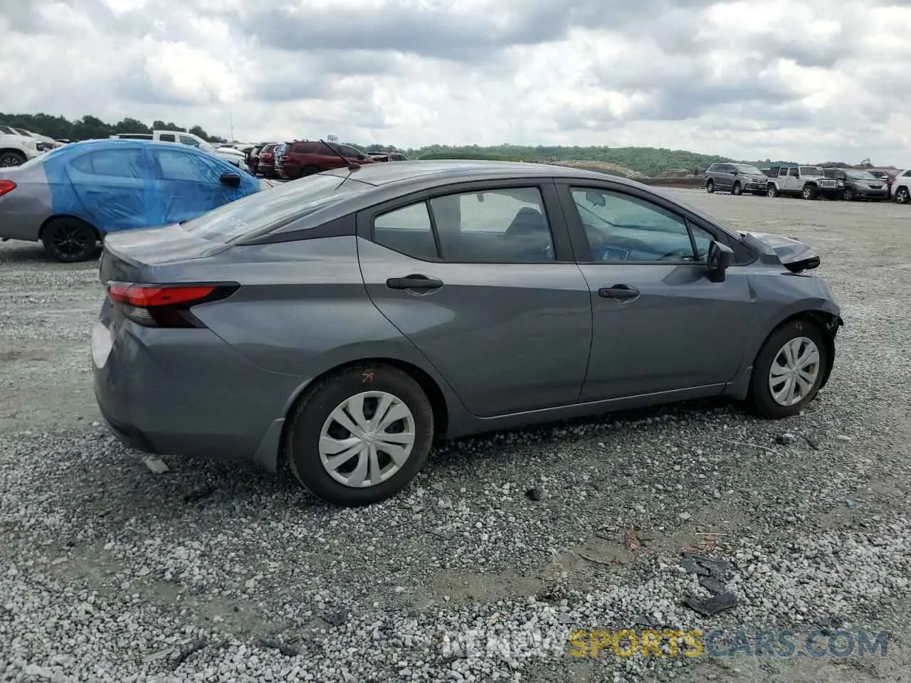 3 Photograph of a damaged car 3N1CN8DV9PL837431 NISSAN VERSA 2023