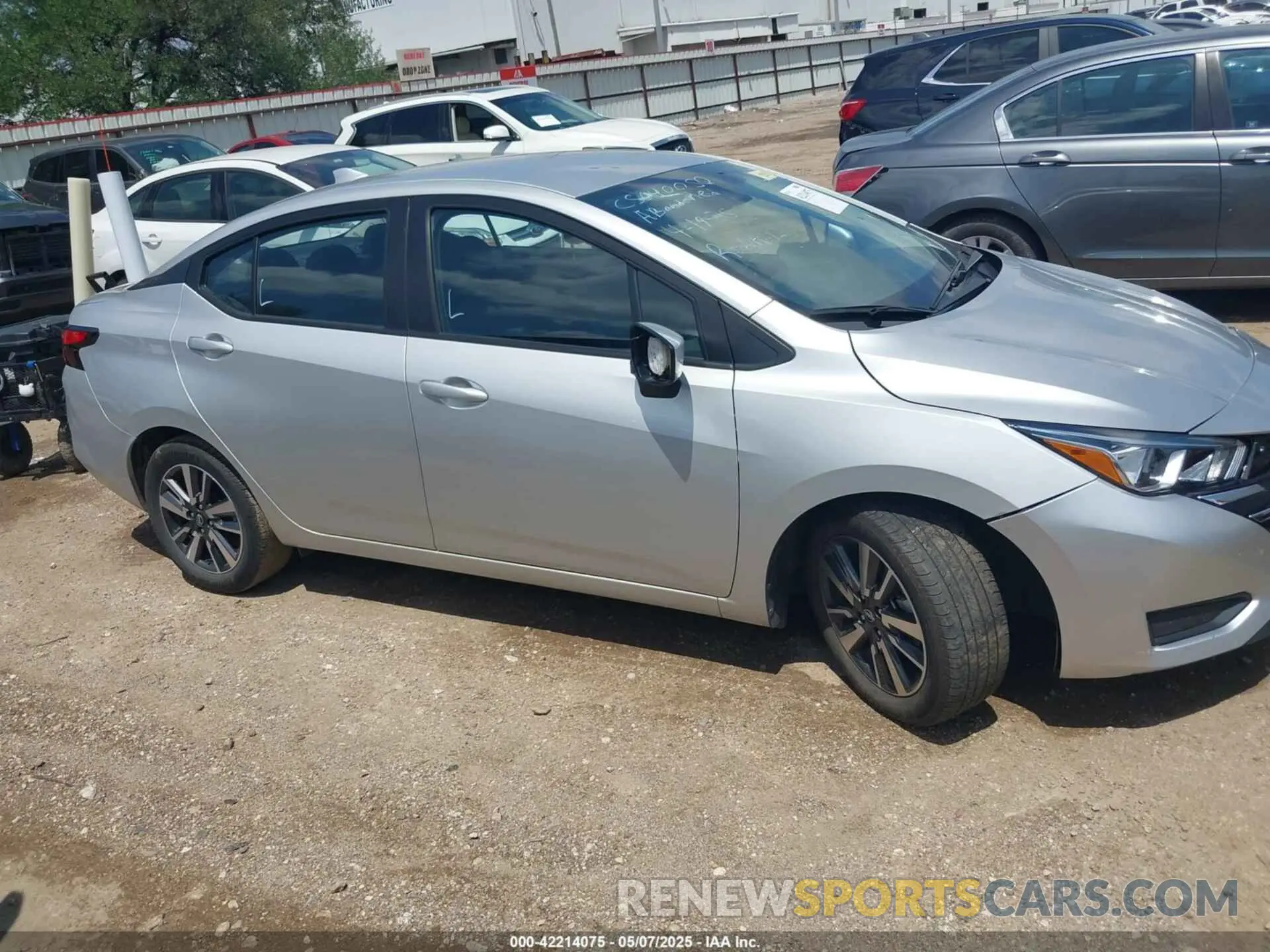 12 Photograph of a damaged car 3N1CN8EV1PL853590 NISSAN VERSA 2023