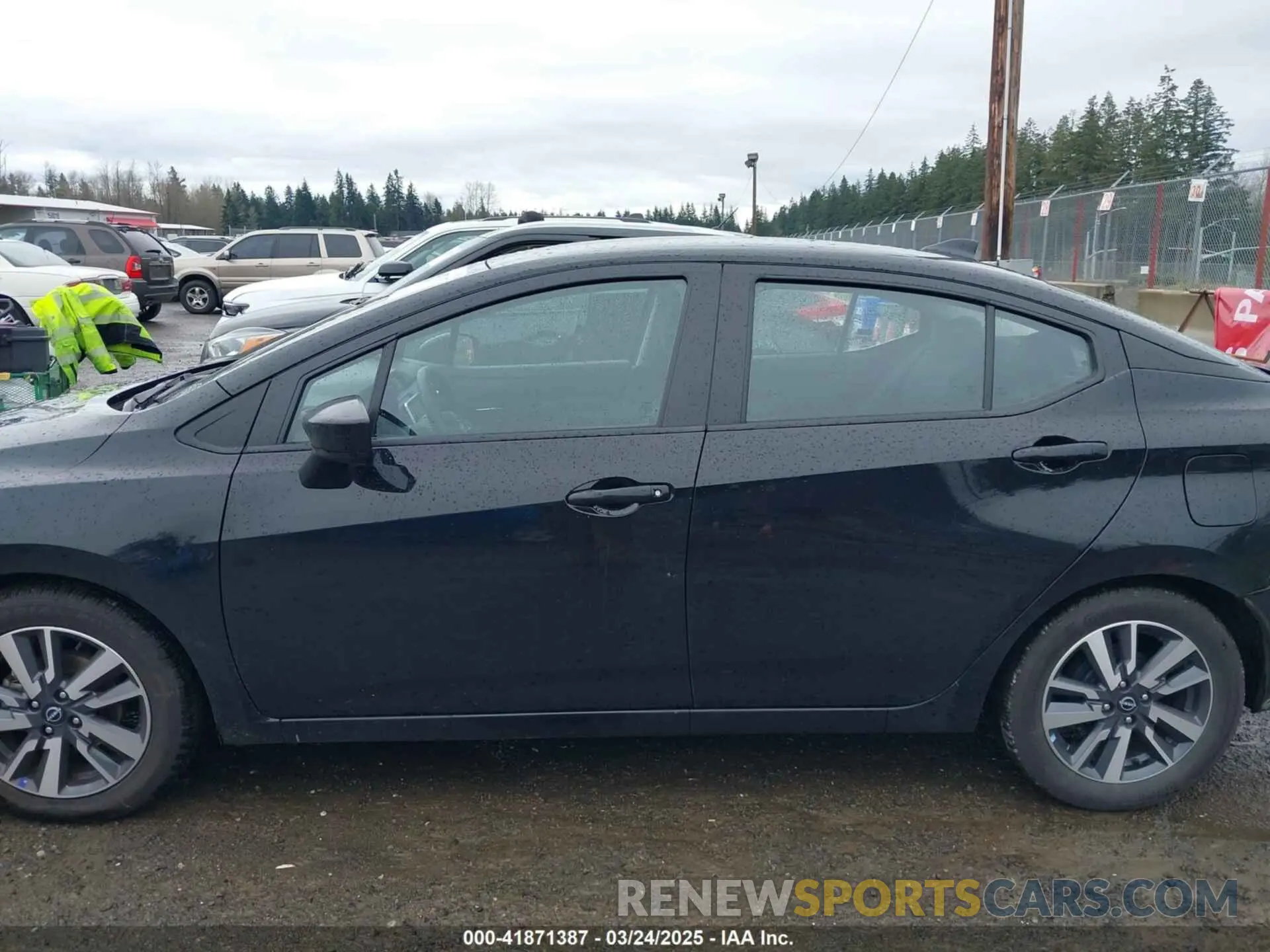 14 Photograph of a damaged car 3N1CN8EV4PL825394 NISSAN VERSA 2023
