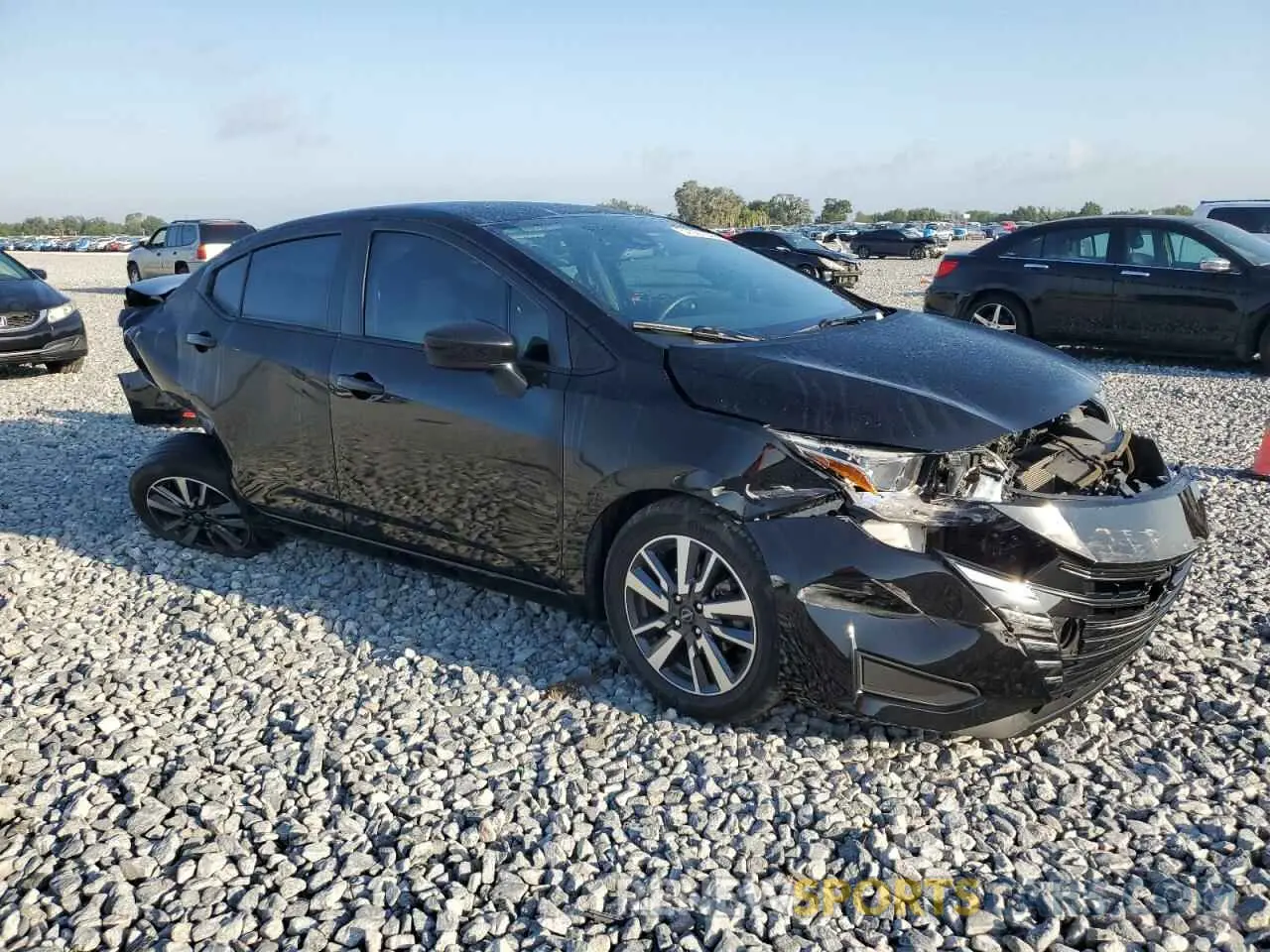 4 Photograph of a damaged car 3N1CN8EVXPL859338 NISSAN VERSA 2023