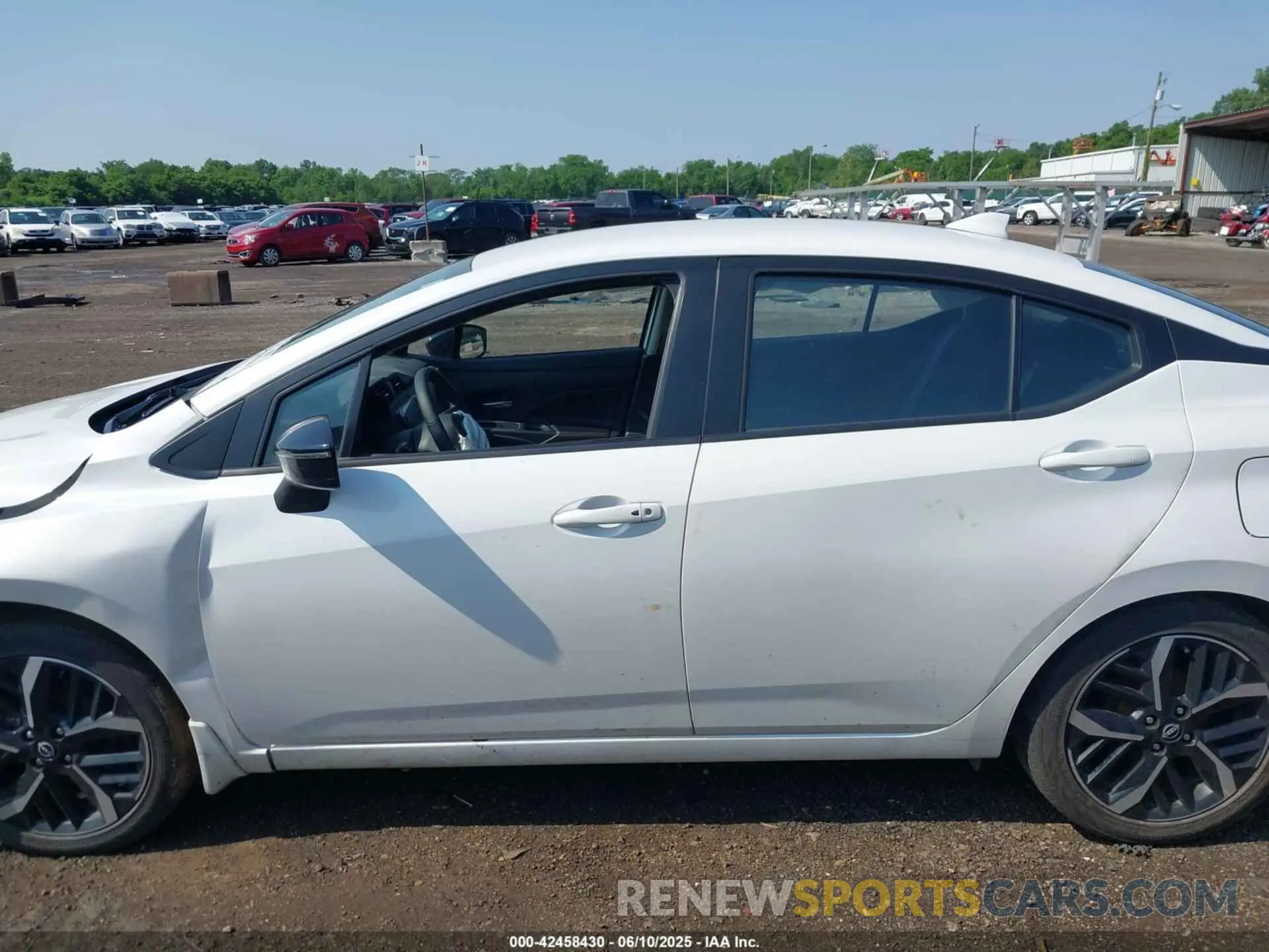 14 Photograph of a damaged car 3N1CN8FV4PL870186 NISSAN VERSA 2023