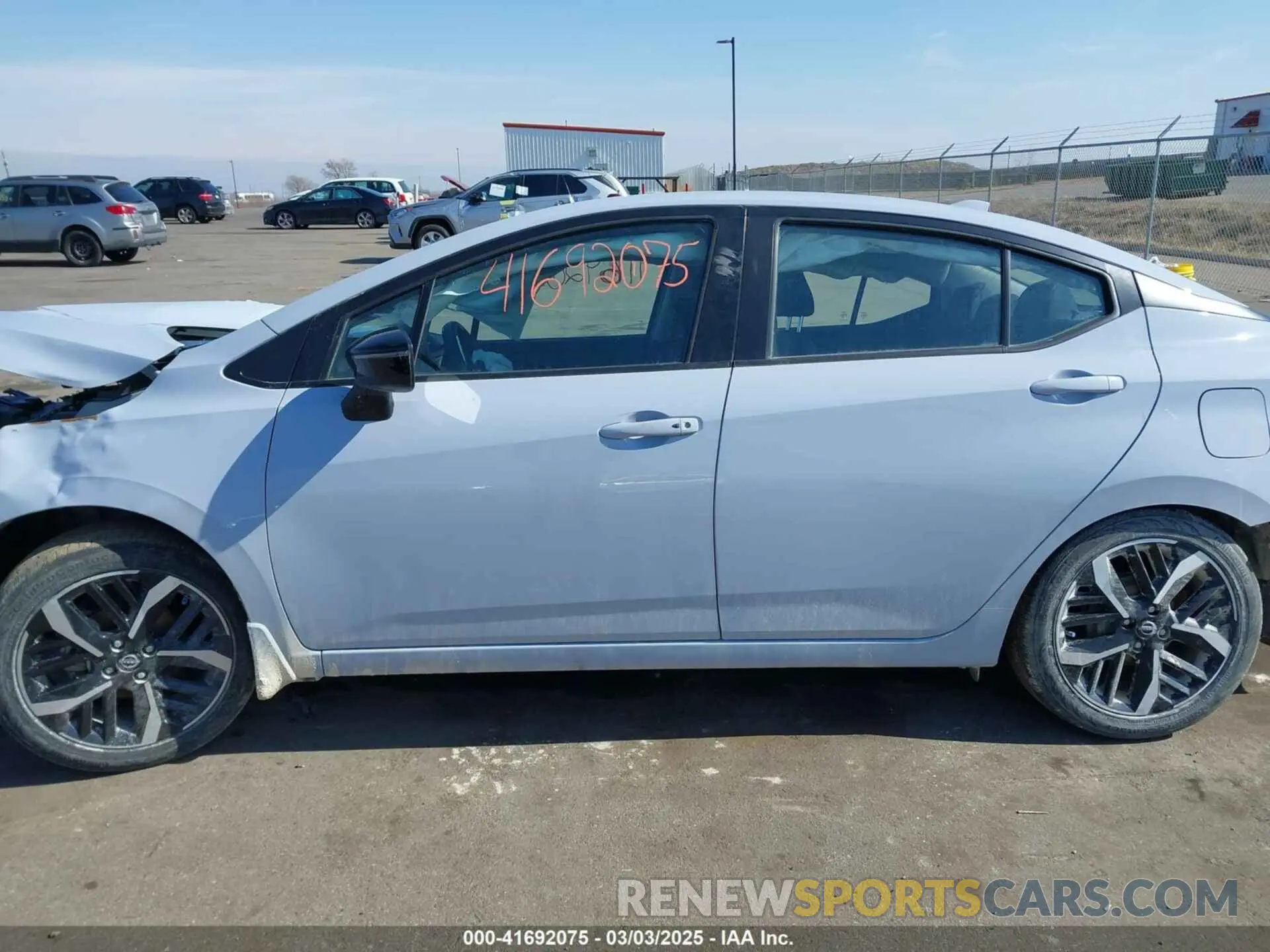 14 Photograph of a damaged car 3N1CN8FV9PL859961 NISSAN VERSA 2023