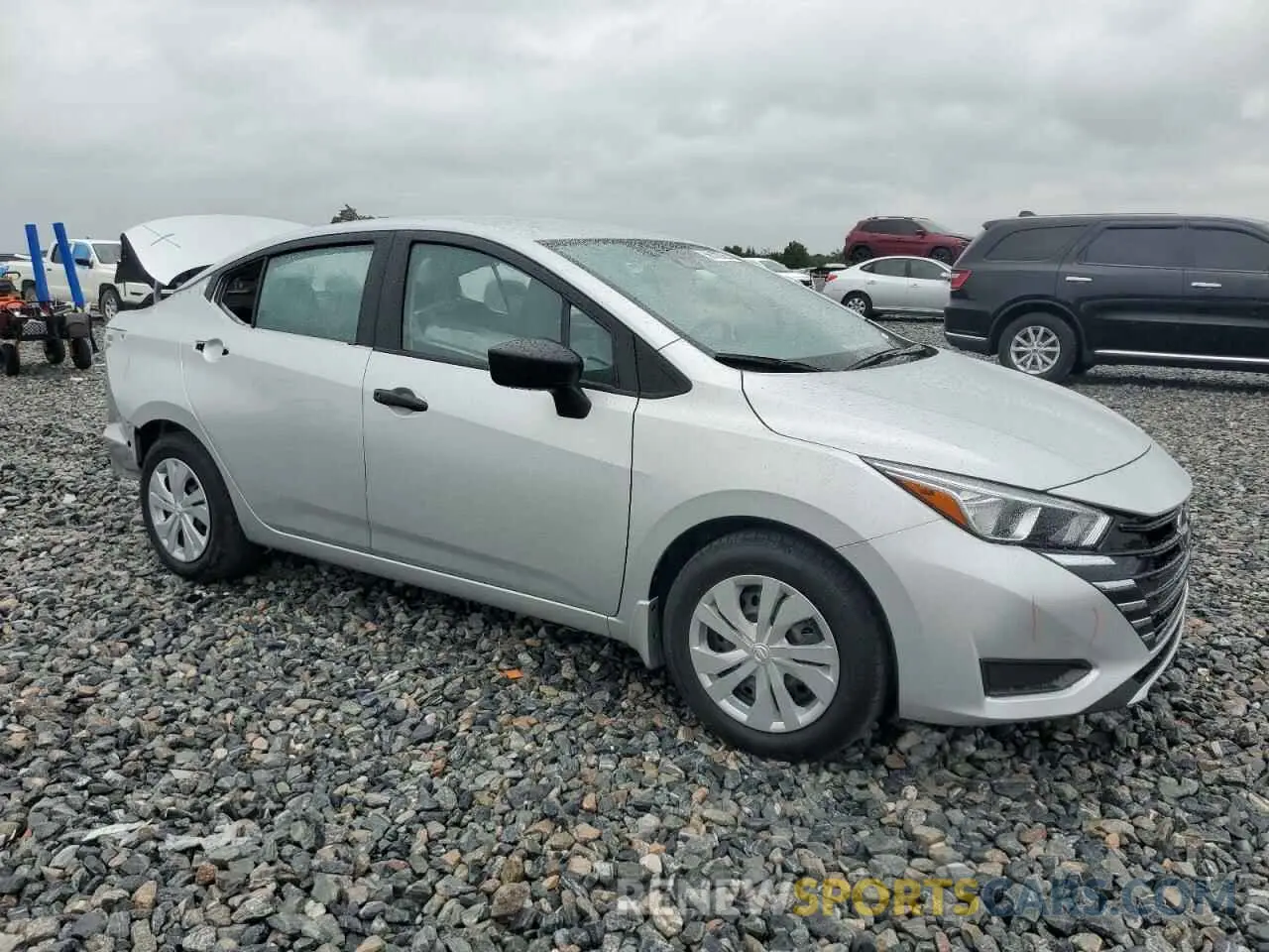 4 Photograph of a damaged car 3N1CN8DV1RL838236 NISSAN VERSA 2024
