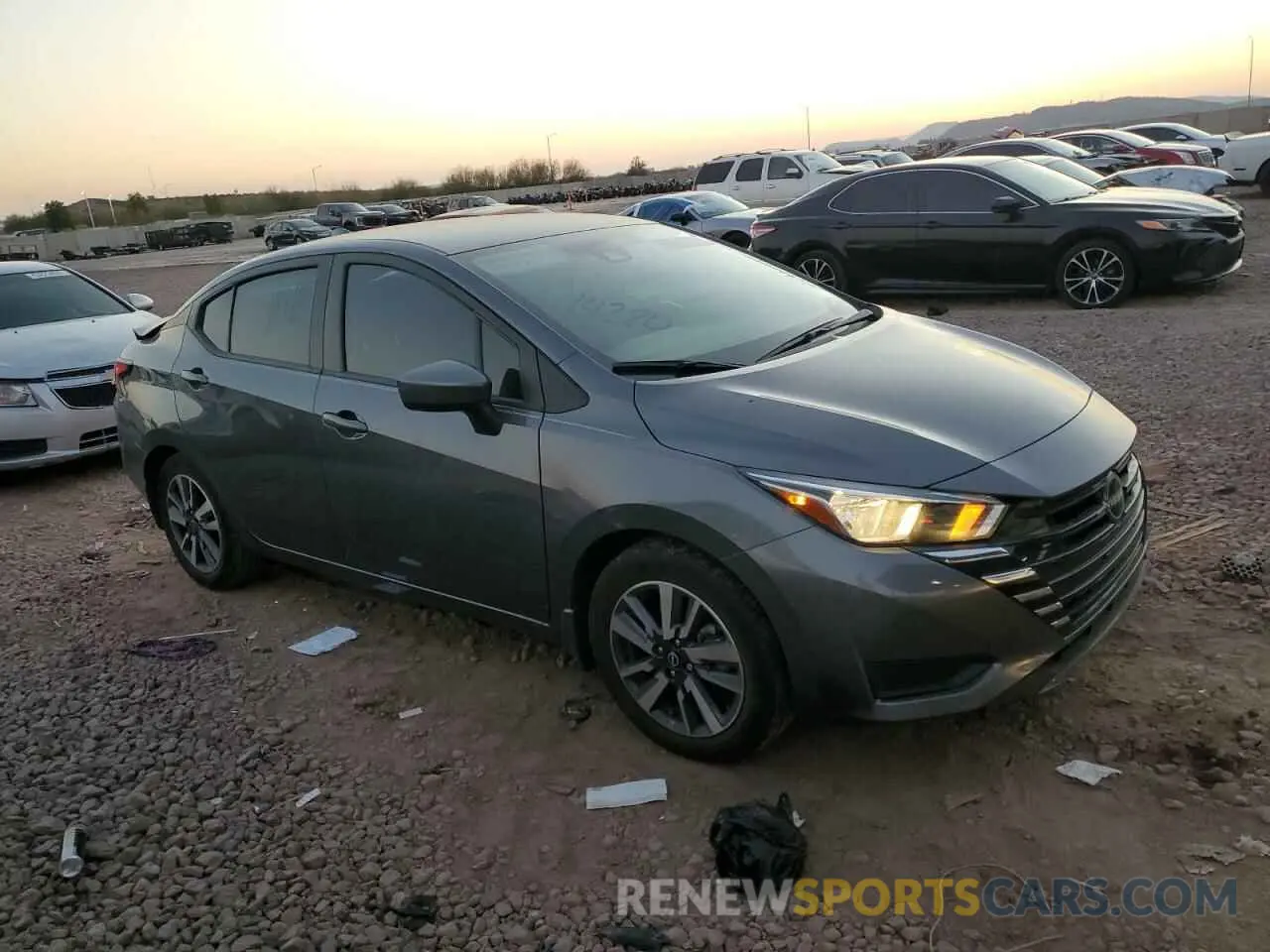 4 Photograph of a damaged car 3N1CN8EV4RL877885 NISSAN VERSA 2024