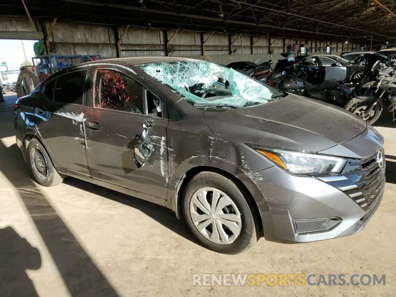 4 Photograph of a damaged car 3N1CN8DV0SL823913 NISSAN VERSA 2025
