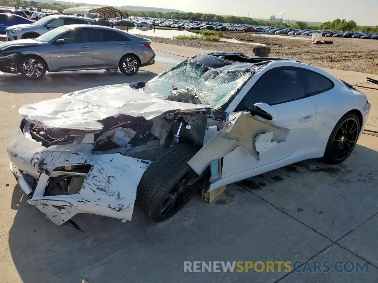 1 Photograph of a damaged car WP0AA2A90KS104215 PORSCHE 911 2019