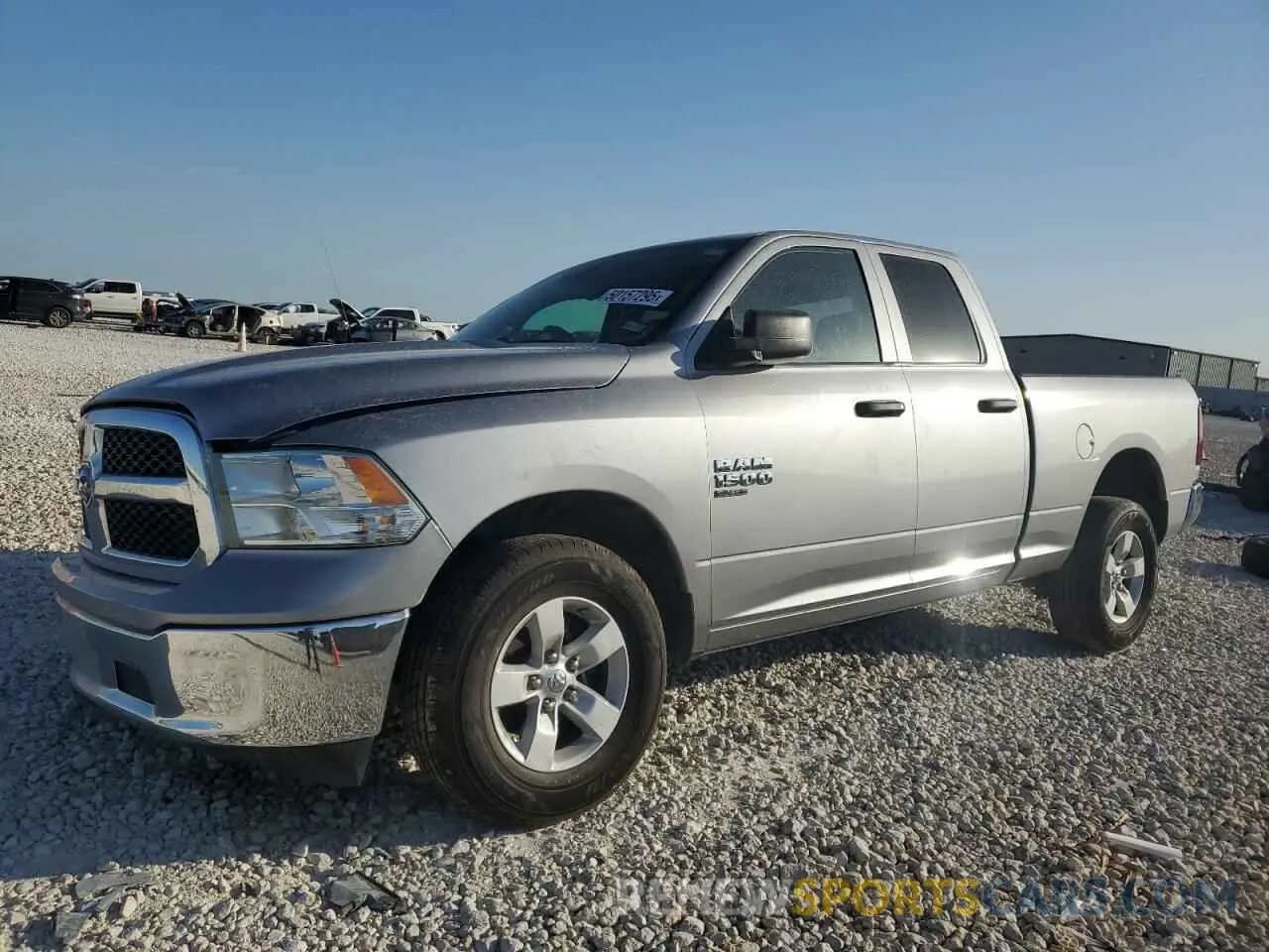 1 Photograph of a damaged car 1C6RR6FG0KS674474 RAM 1500 2019