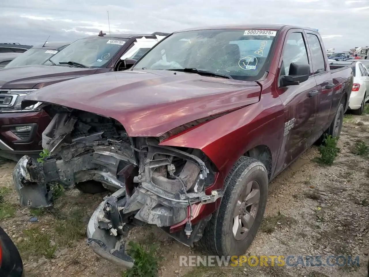 1 Photograph of a damaged car 1C6RR6FG0KS733202 RAM 1500 2019