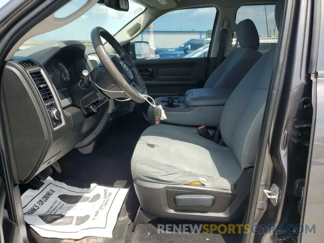 7 Photograph of a damaged car 1C6RR6FG1KS620004 RAM 1500 2019