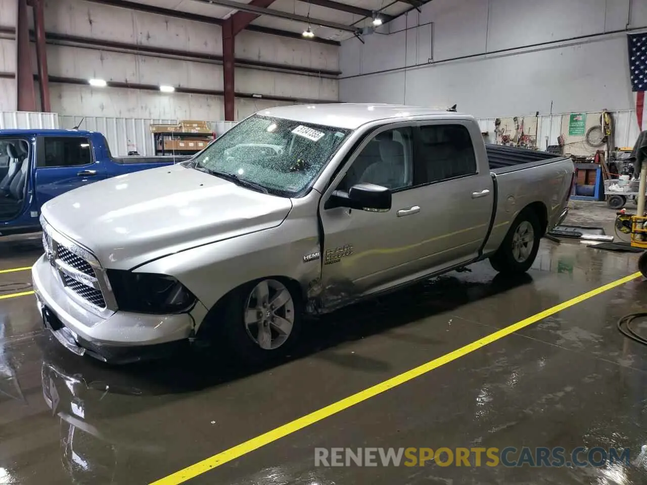 1 Photograph of a damaged car 1C6RR6LT0KS549041 RAM 1500 2019