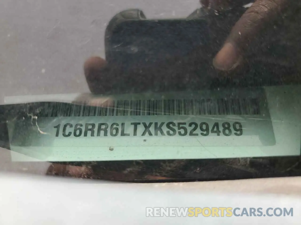 12 Photograph of a damaged car 1C6RR6LTXKS529489 RAM 1500 2019