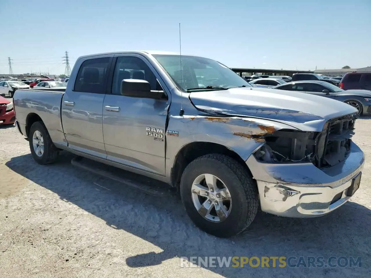 4 Photograph of a damaged car 1C6RR6TT8KS704743 RAM 1500 2019