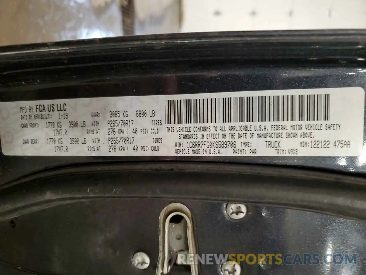 12 Photograph of a damaged car 1C6RR7FG0KS589706 RAM 1500 2019