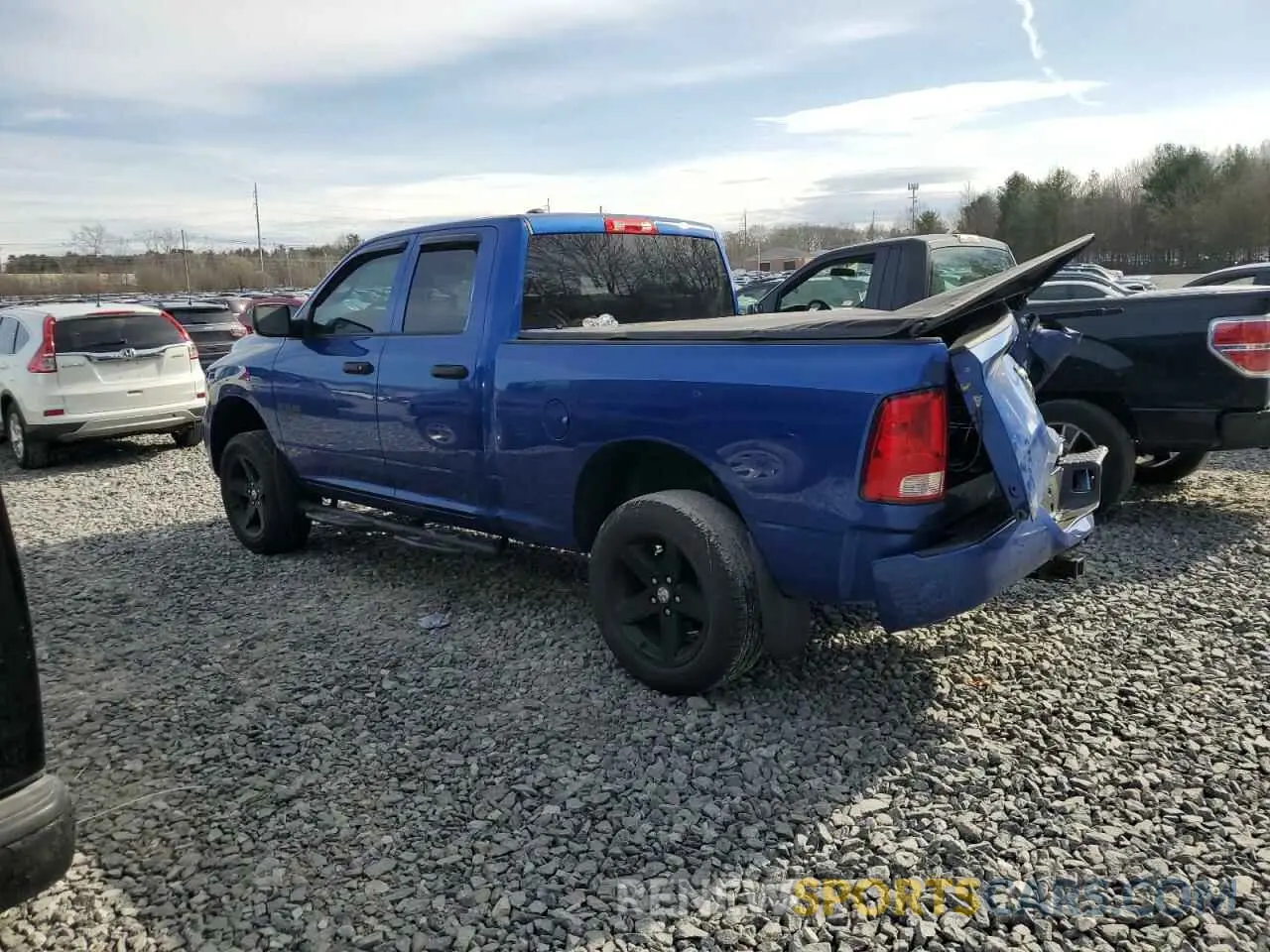 2 Photograph of a damaged car 1C6RR7FG8KS612715 RAM 1500 2019