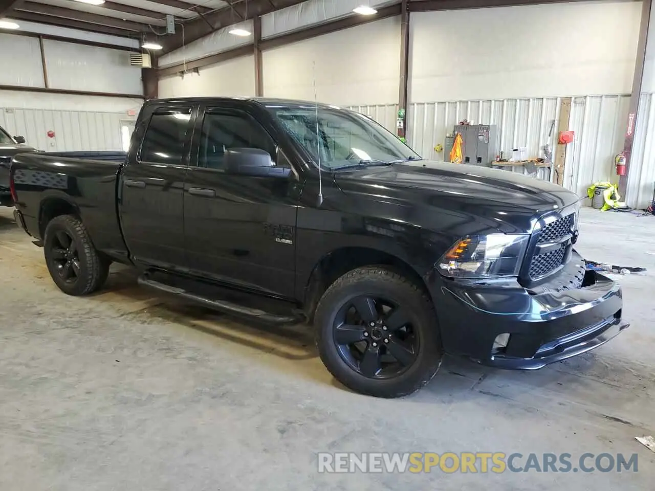 4 Photograph of a damaged car 1C6RR7FG9KS543985 RAM 1500 2019