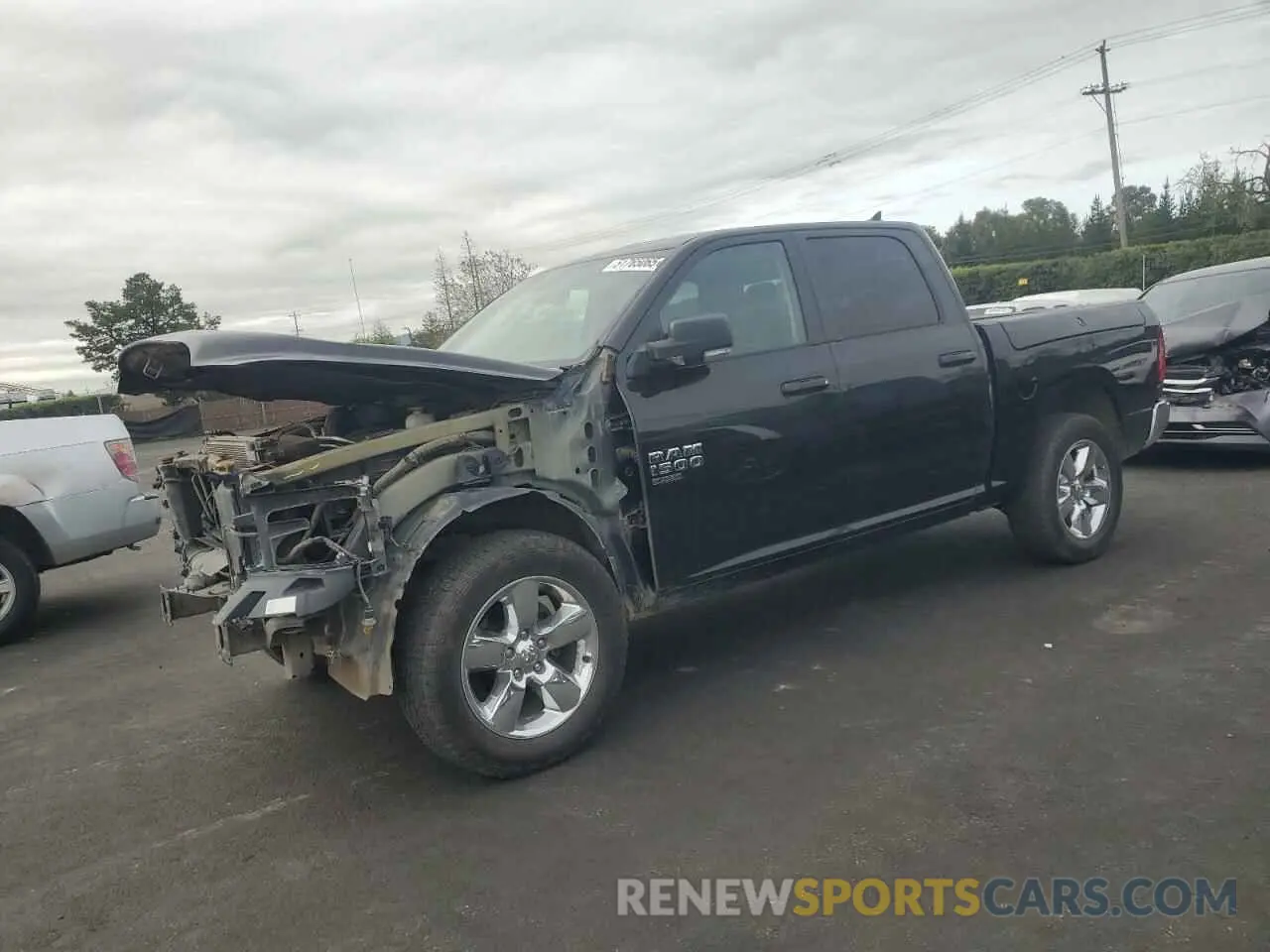1 Photograph of a damaged car 1C6RR7LT2KS527502 RAM 1500 2019